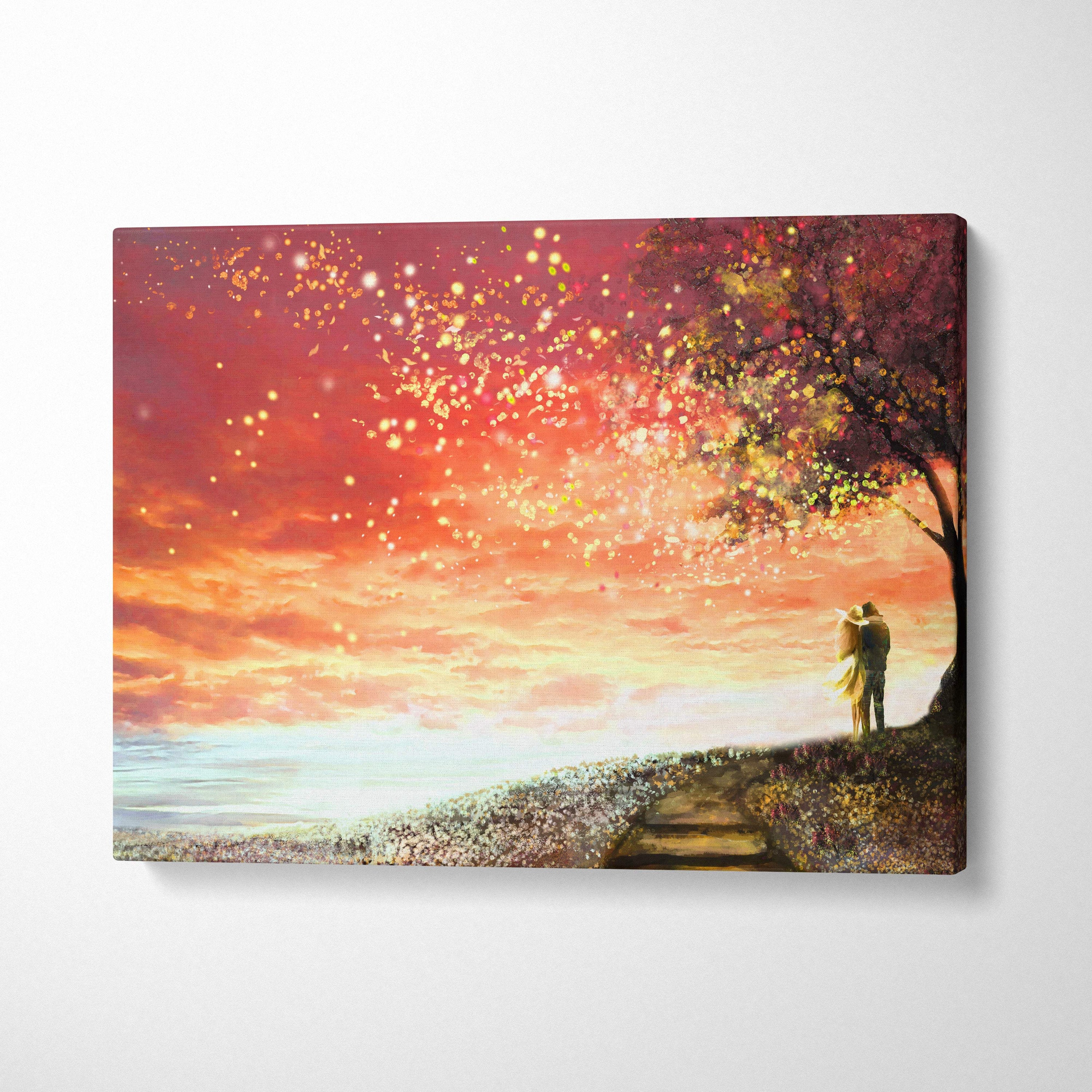 Rectangular canvas print of a romantic couple embracing under a blossoming tree at sunset with glowing pink and orange sky