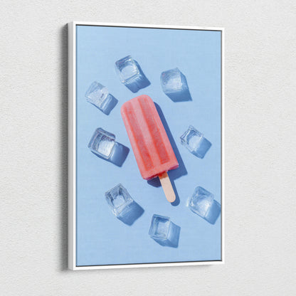 Canvas wall art featuring a vibrant red popsicle surrounded by ice cubes on a light blue background.