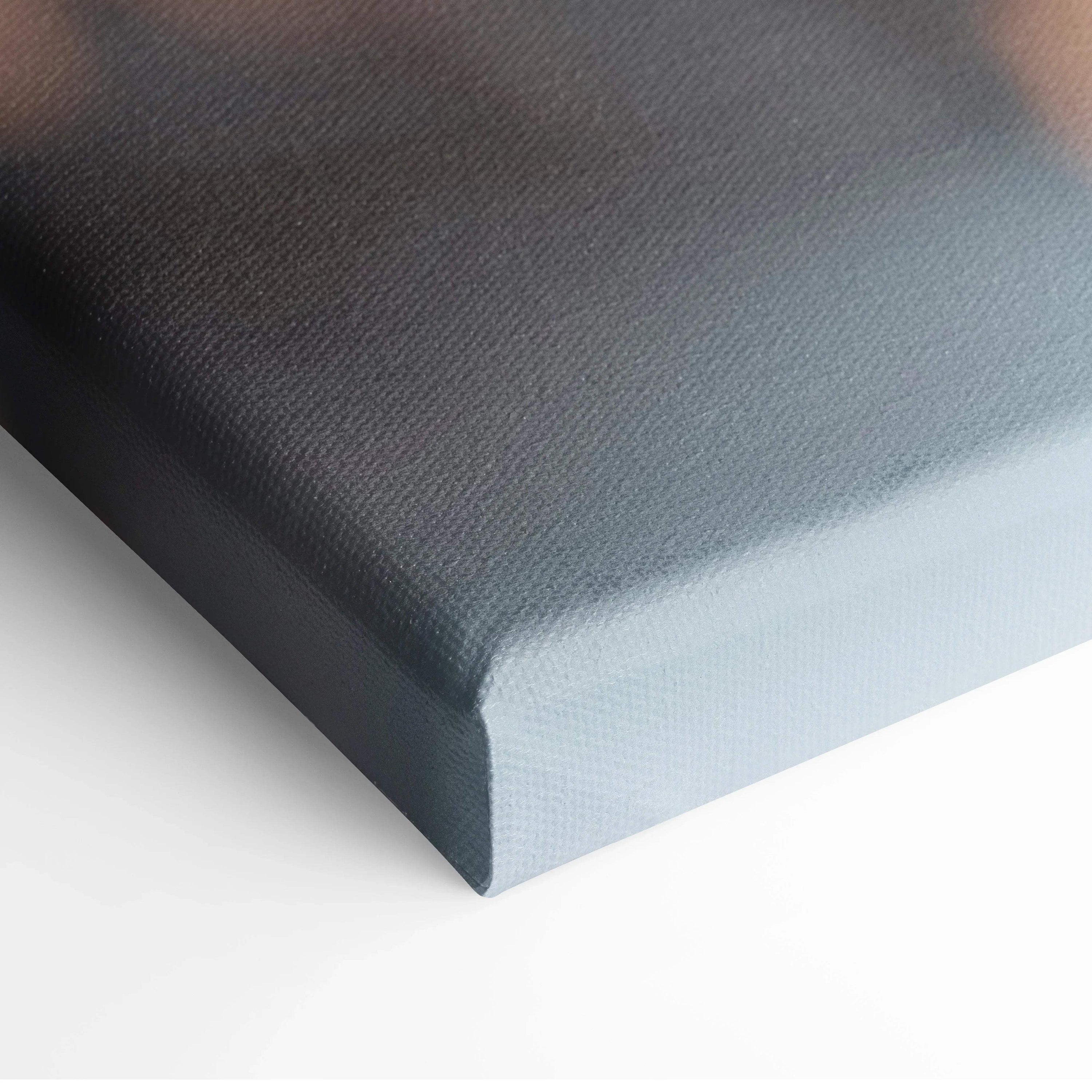 Close-up of stretched canvas corner with smooth, white textured surface for wall art.