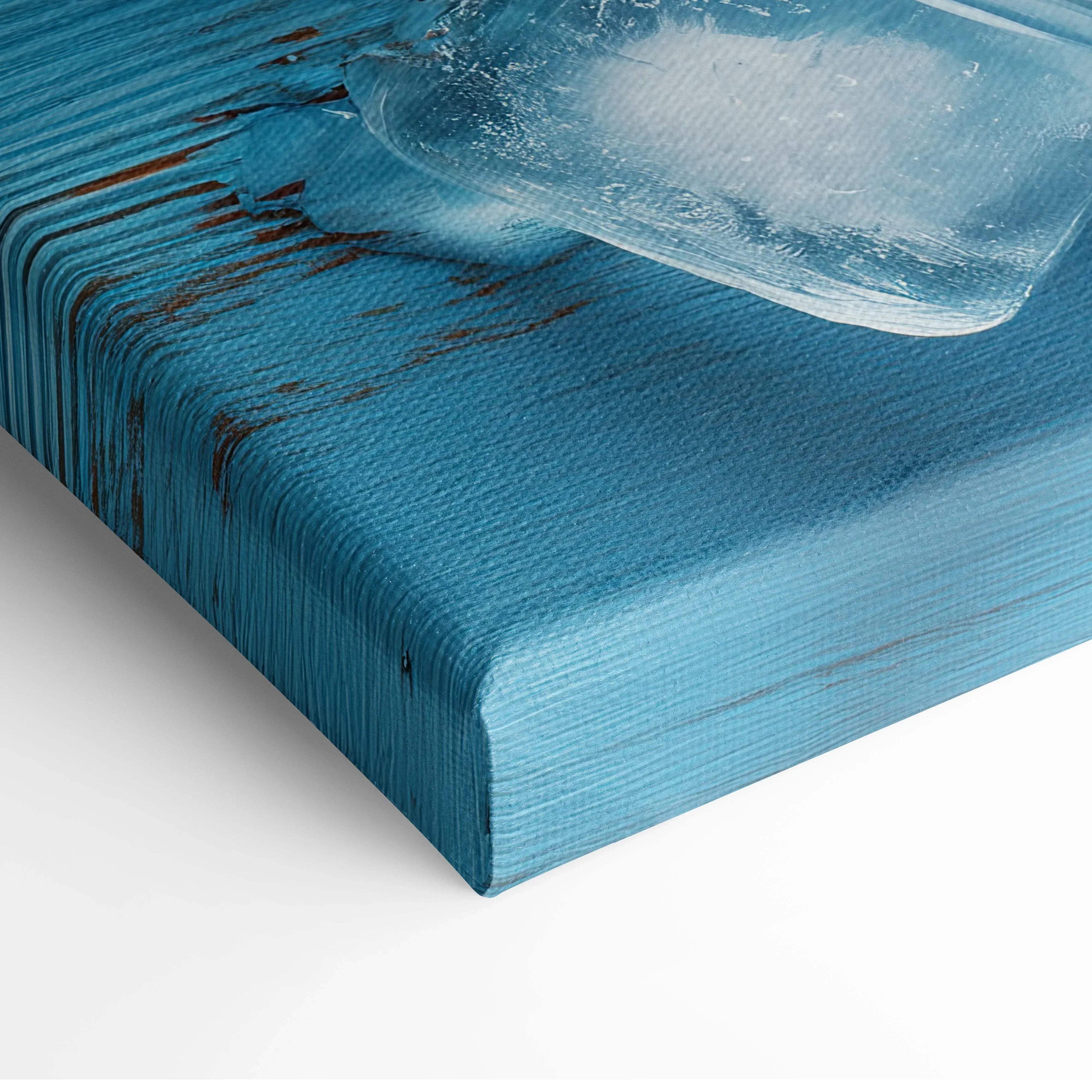 Blue textured canvas wall art corner with digital food art featuring ice cubes and water droplets.