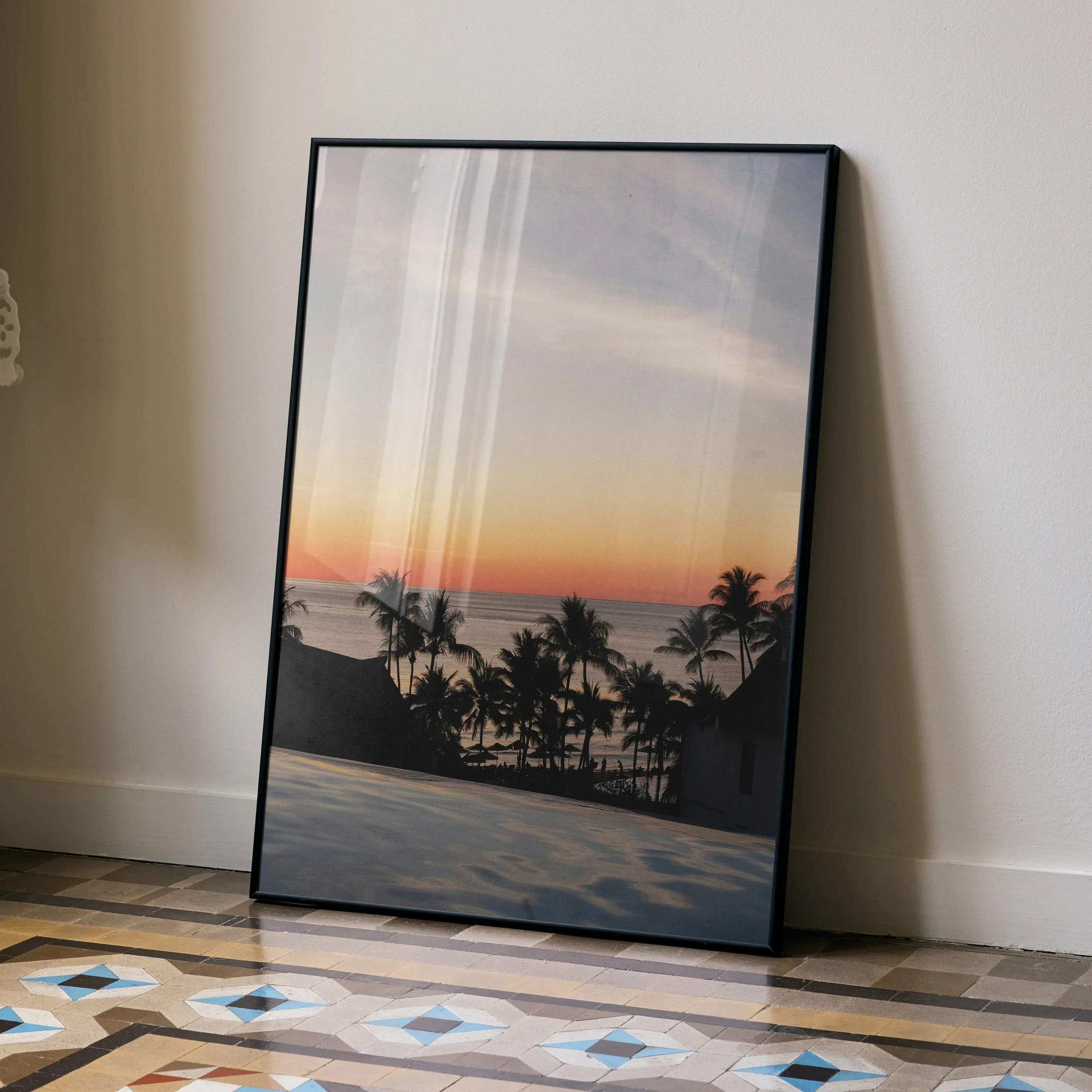 Serene beach sunset poster with silhouetted palm trees and calm ocean as wall art.