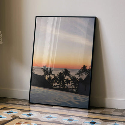 Serene beach sunset poster with silhouetted palm trees and calm ocean as wall art.