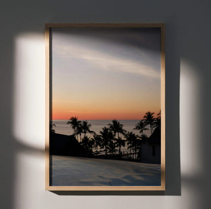 Serene beach sunset poster with palm trees silhouette and soft pastel sky wall art.