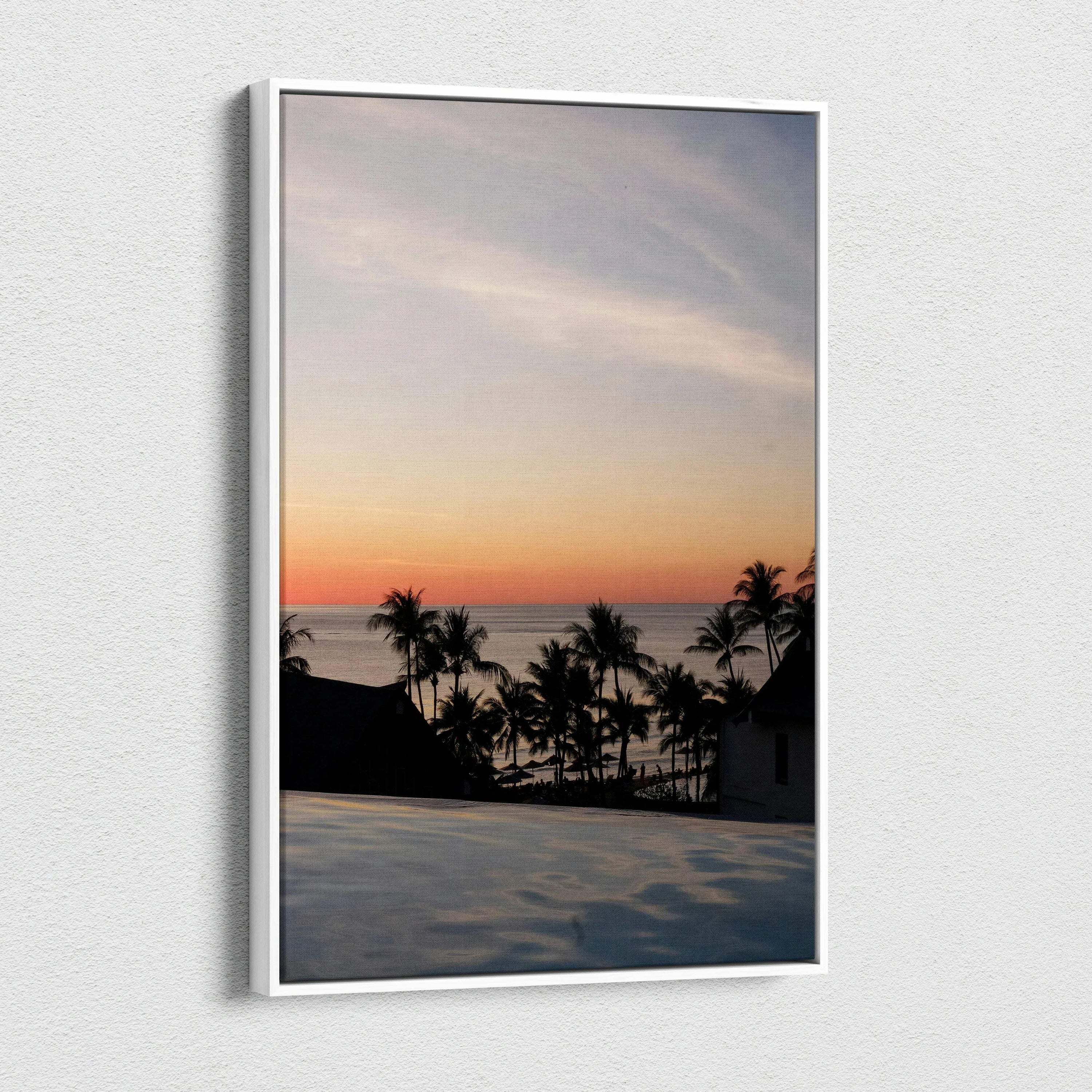 Vivid golden sunset beach scene with palm trees on canvas wall art in vertical format.