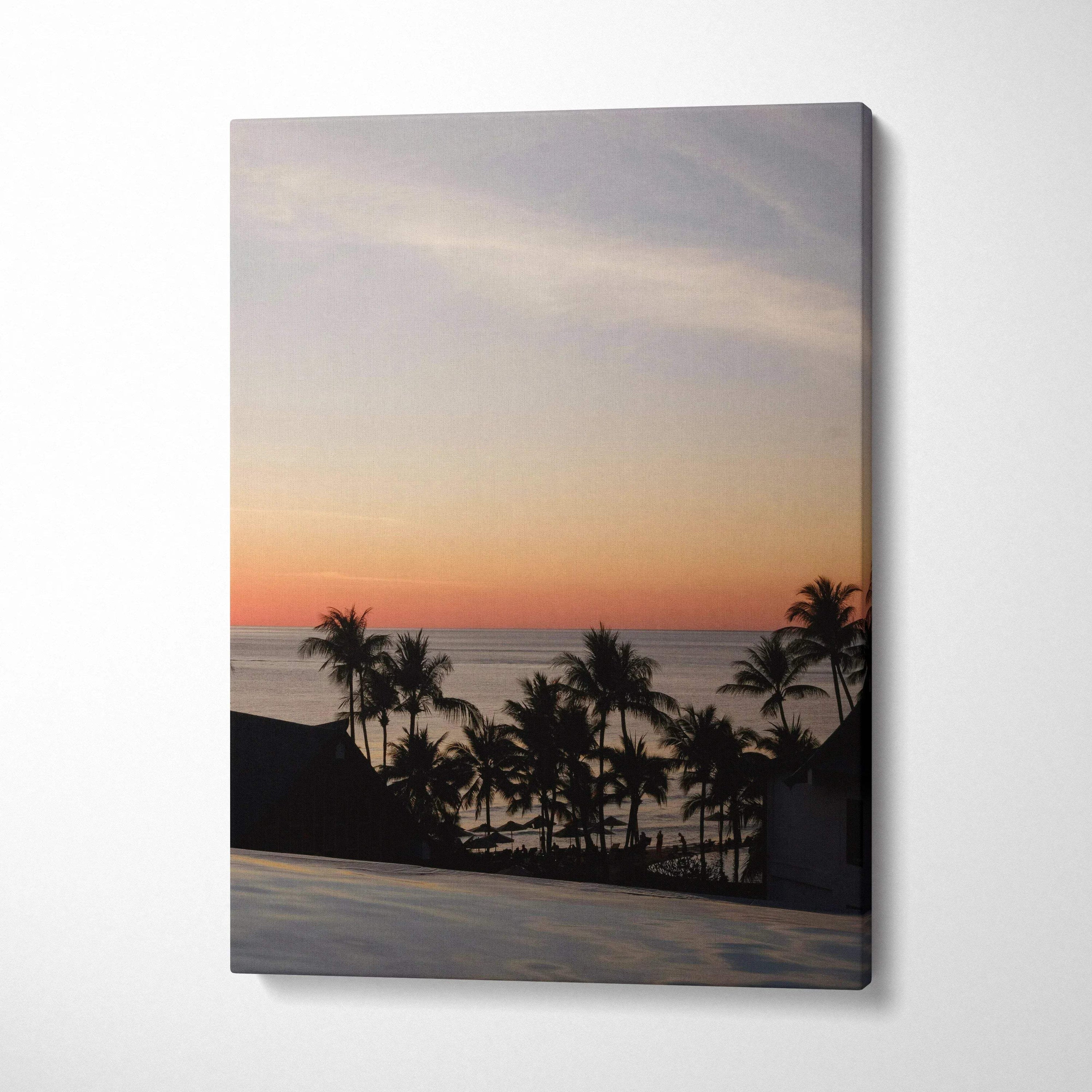 Golden sunset beach scene with silhouetted palm trees on canvas wall art.
