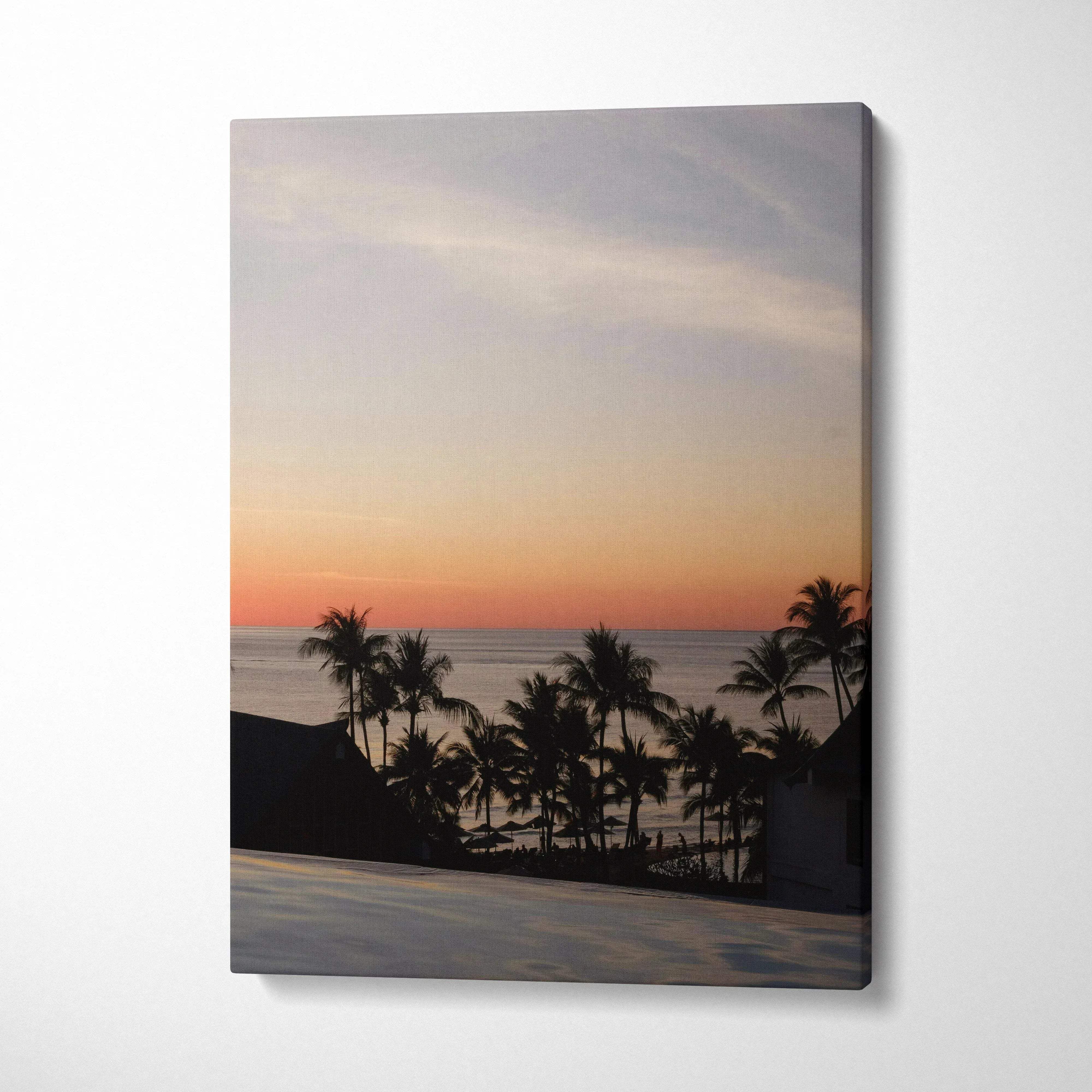 Golden sunset beach scene with silhouetted palm trees on canvas wall art.