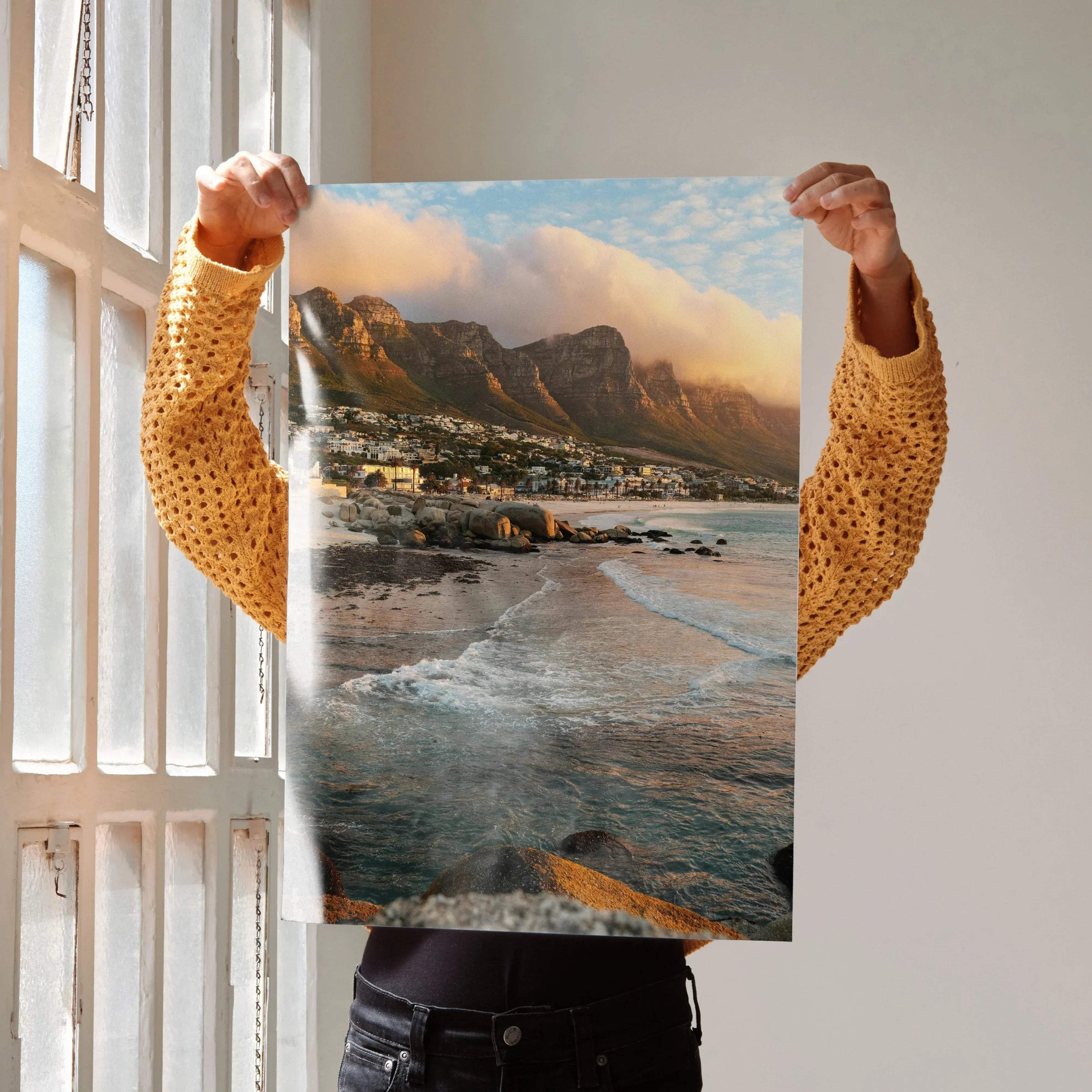 Vertical beach sunset nature art poster featuring dramatic clouds over rocky shoreline wall art.