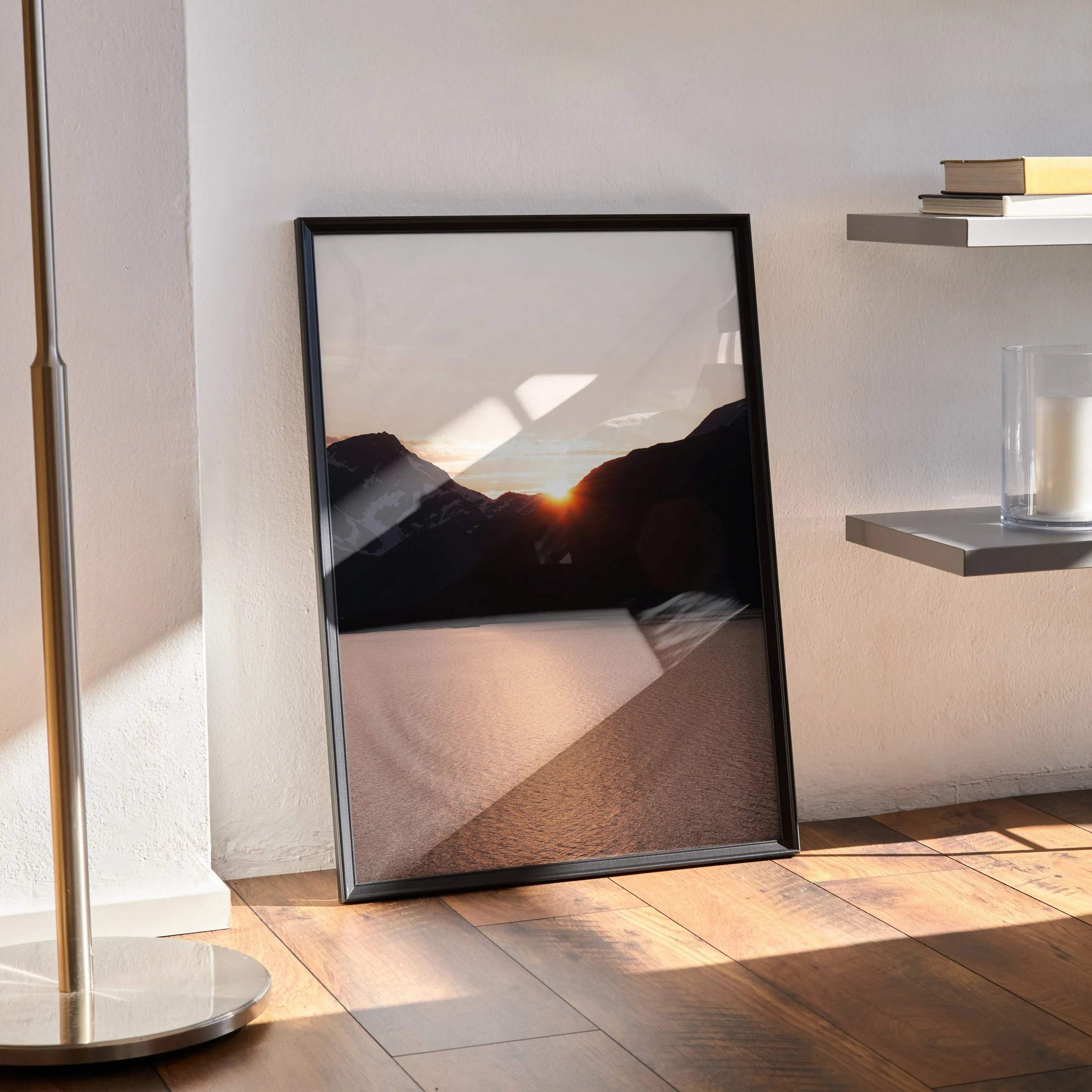 Vertical poster of mountains at sunset with warm orange and dark silhouettes wall art.