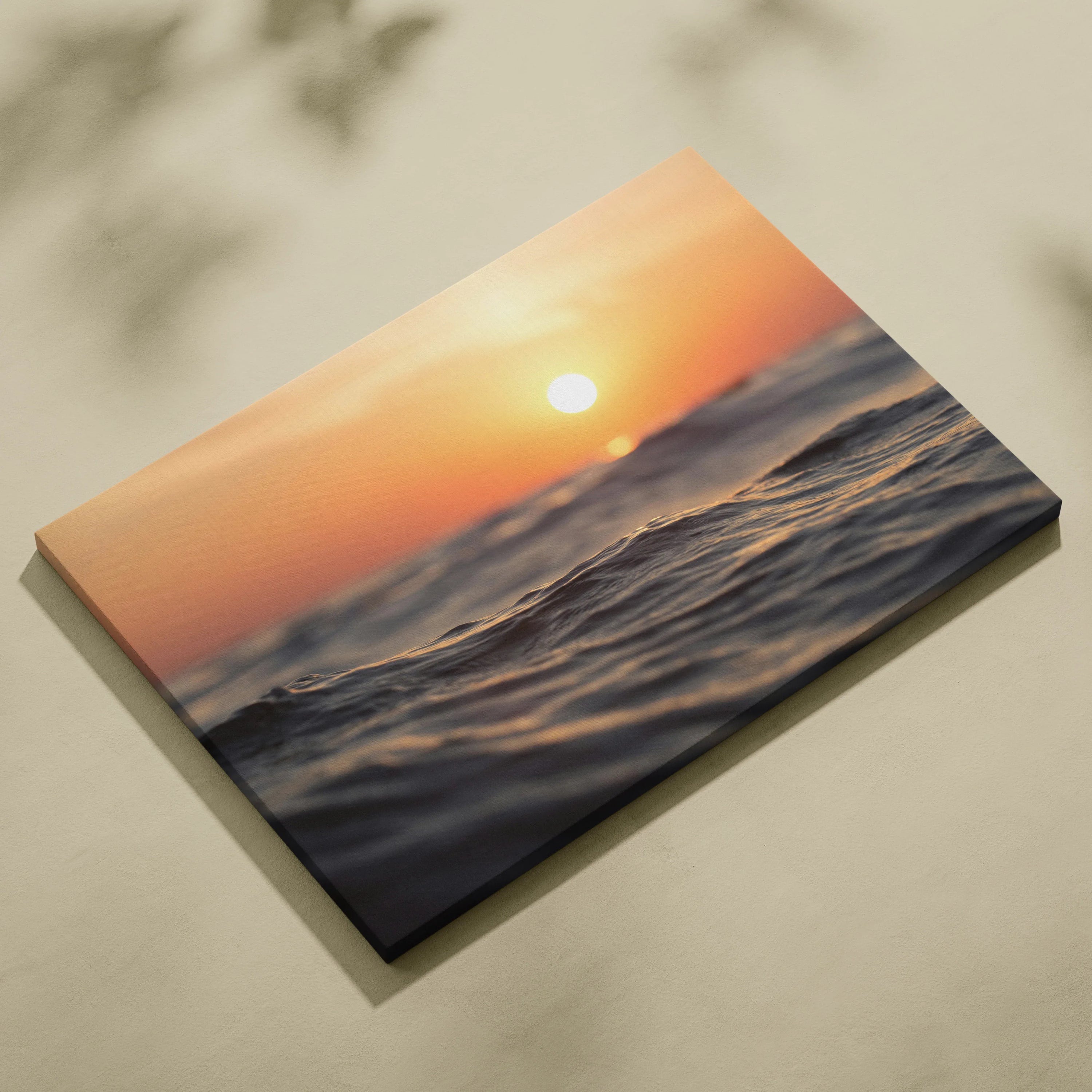 Sunset ocean scene canvas wall art with warm orange sky and gentle waves.