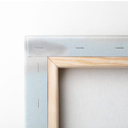 Light blue canvas wall art stretched over natural wood frame with subtle stitching from contemporary flying books print