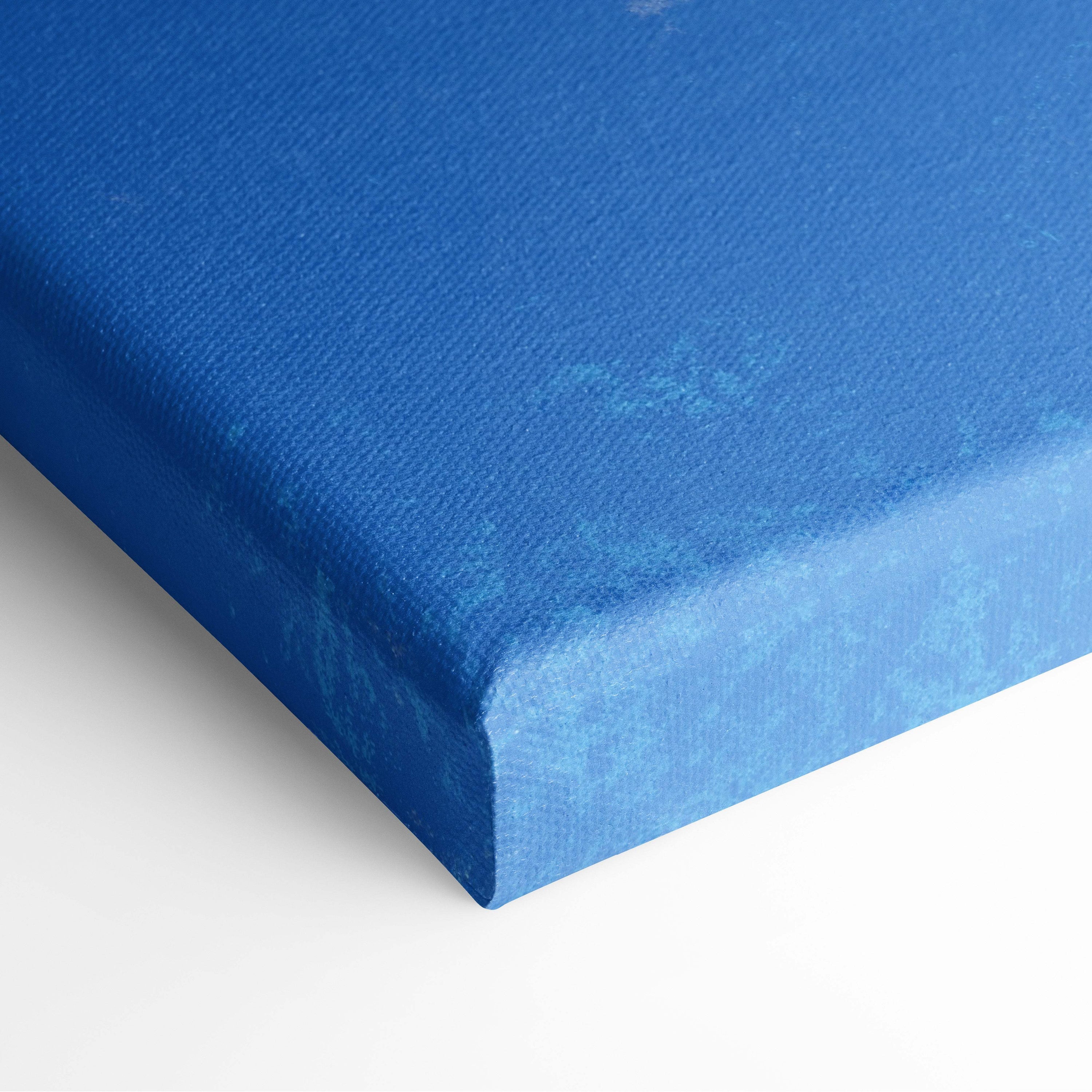 Contemporary blue isolation canvas wall art with textured woven surface featuring minimal glass cube figure print