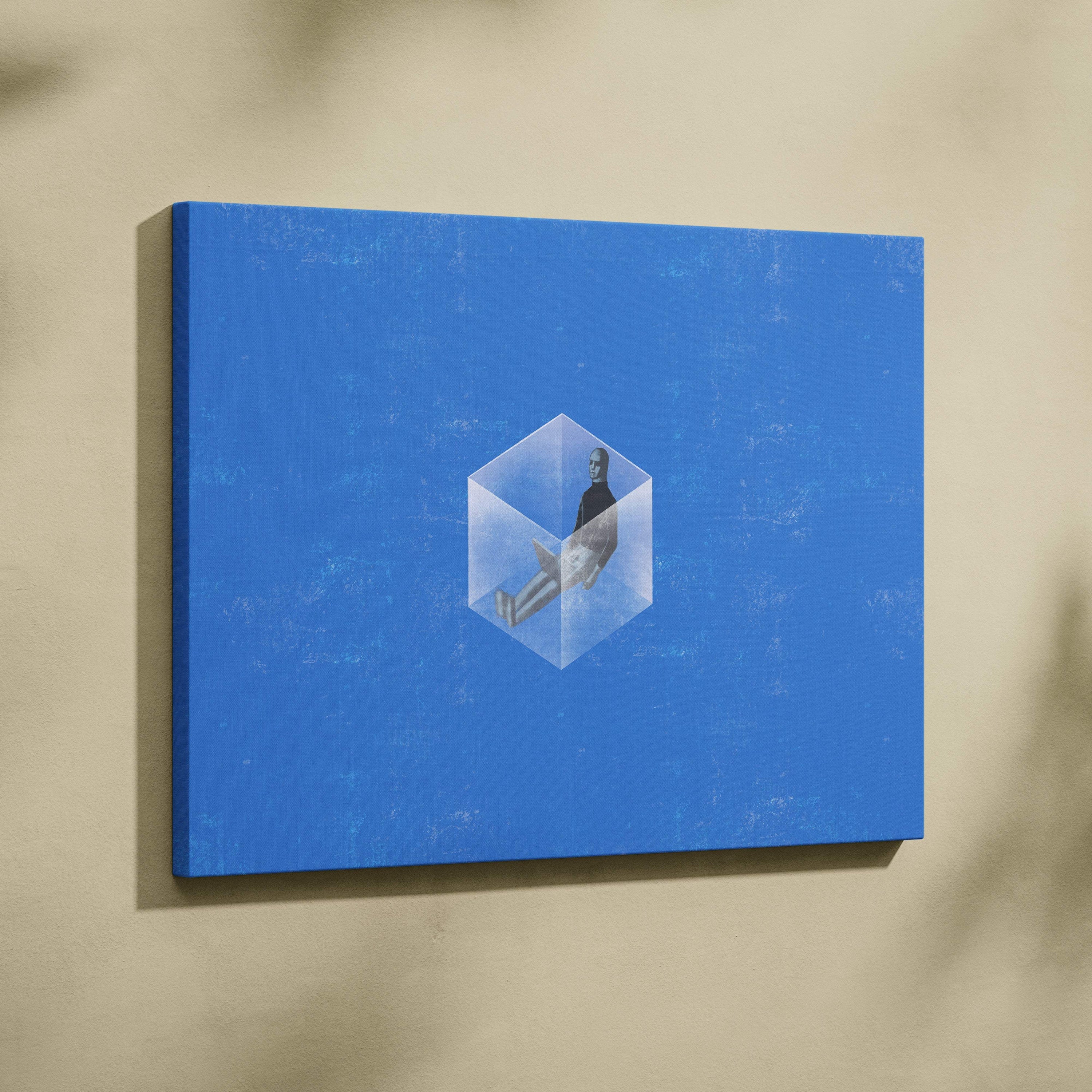 Contemporary blue canvas wall art featuring a transparent glass cube with a figure inside on a solid blue background