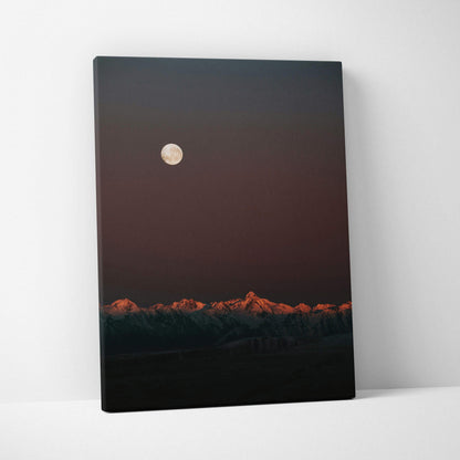 Mountain landscape canvas wall art with a full moon and dark twilight sky.