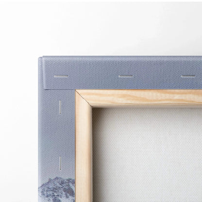 Close-up of wooden frame corner with tightly stretched canvas for wall art.