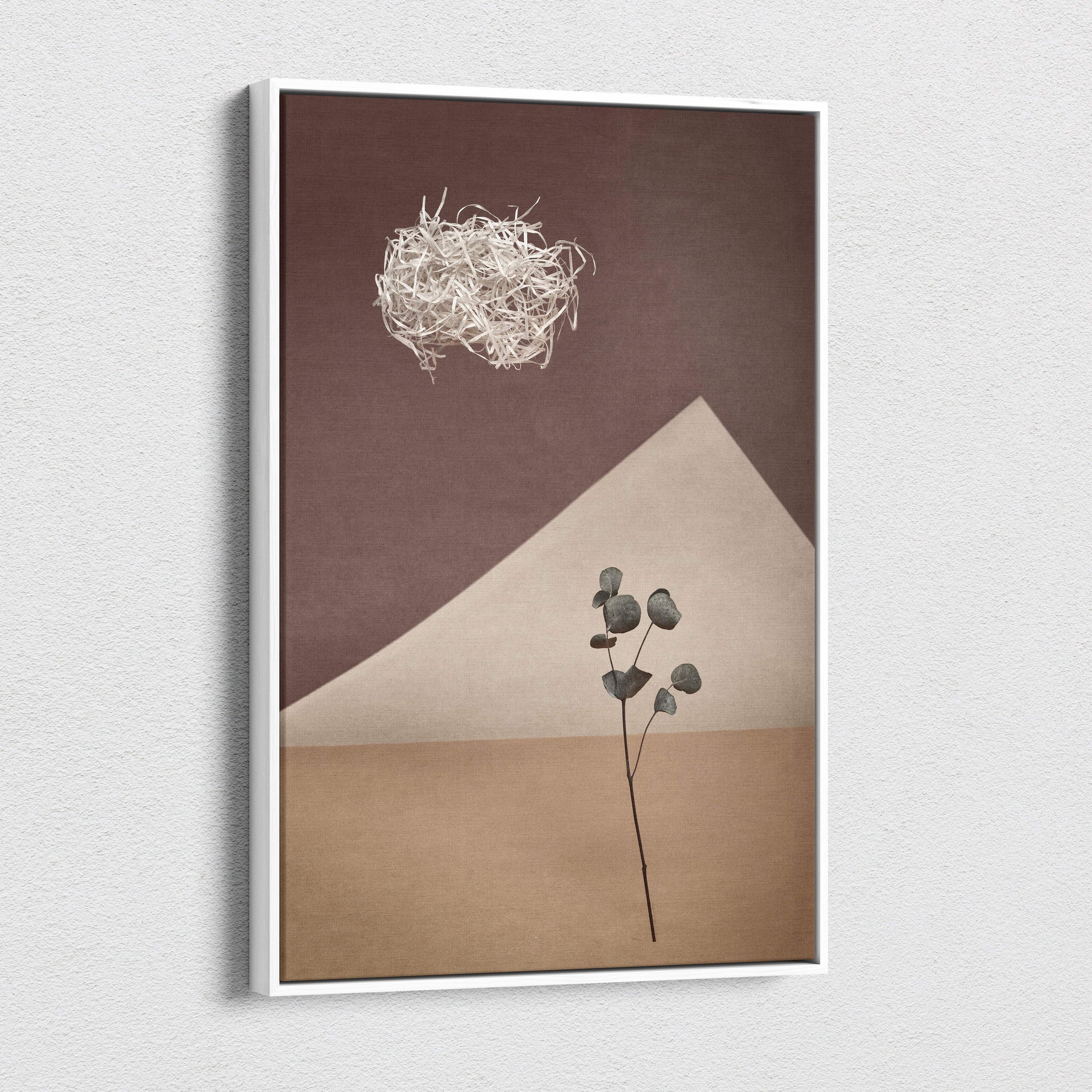 Contemporary neutral botanical canvas wall art featuring minimalist white wire nest and eucalyptus branch on brown beige background