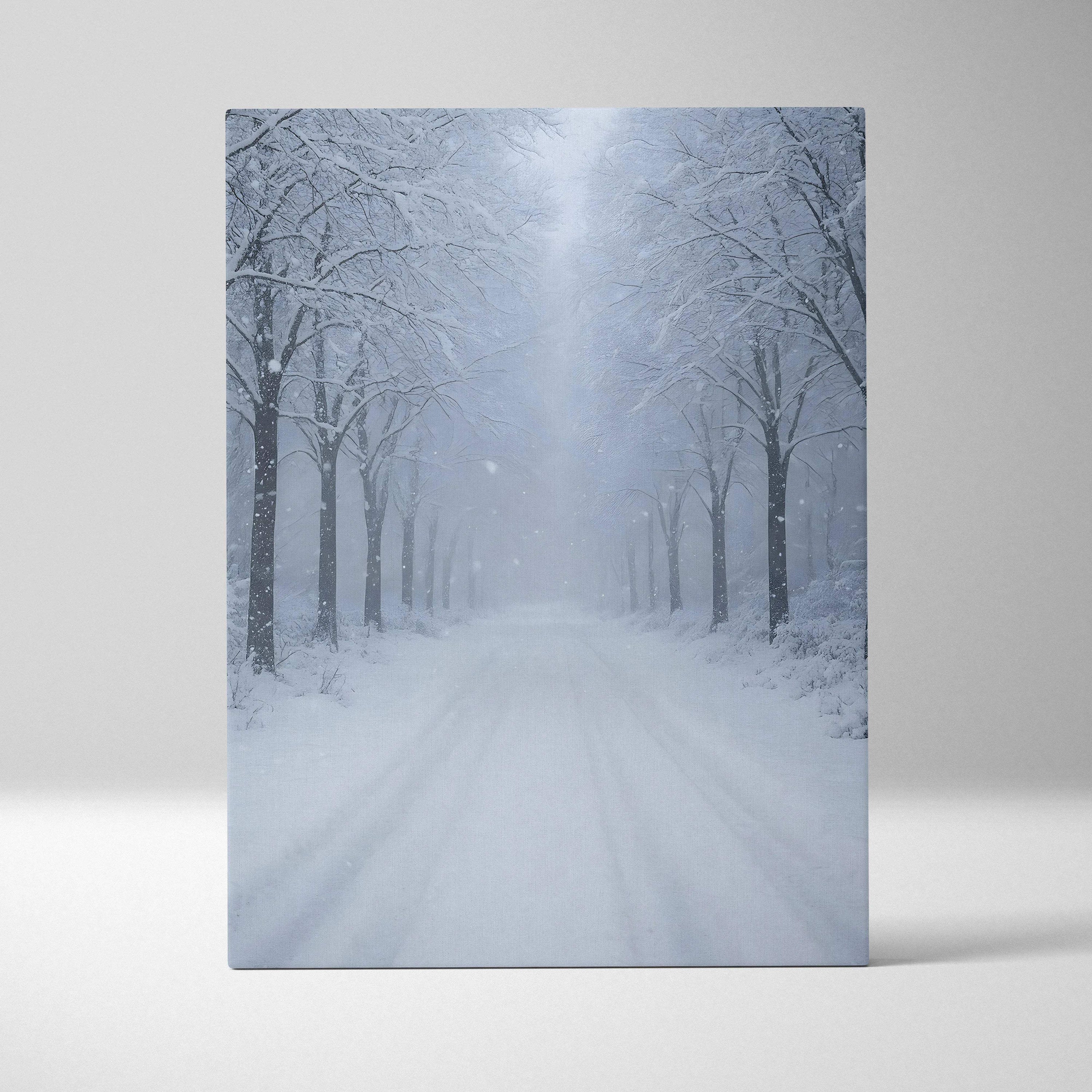 Snowy forest path with tall bare trees covered in frost canvas wall art print.