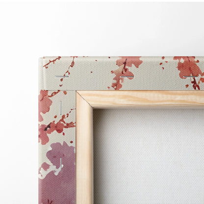 Close-up of wooden frame corner on cherry blossom watercolor canvas wall art with soft pink tones.