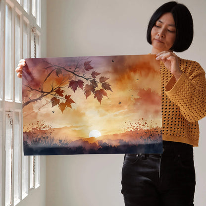 Sunset watercolor nature poster with warm orange and purple hues and silhouetted leaves wall art.