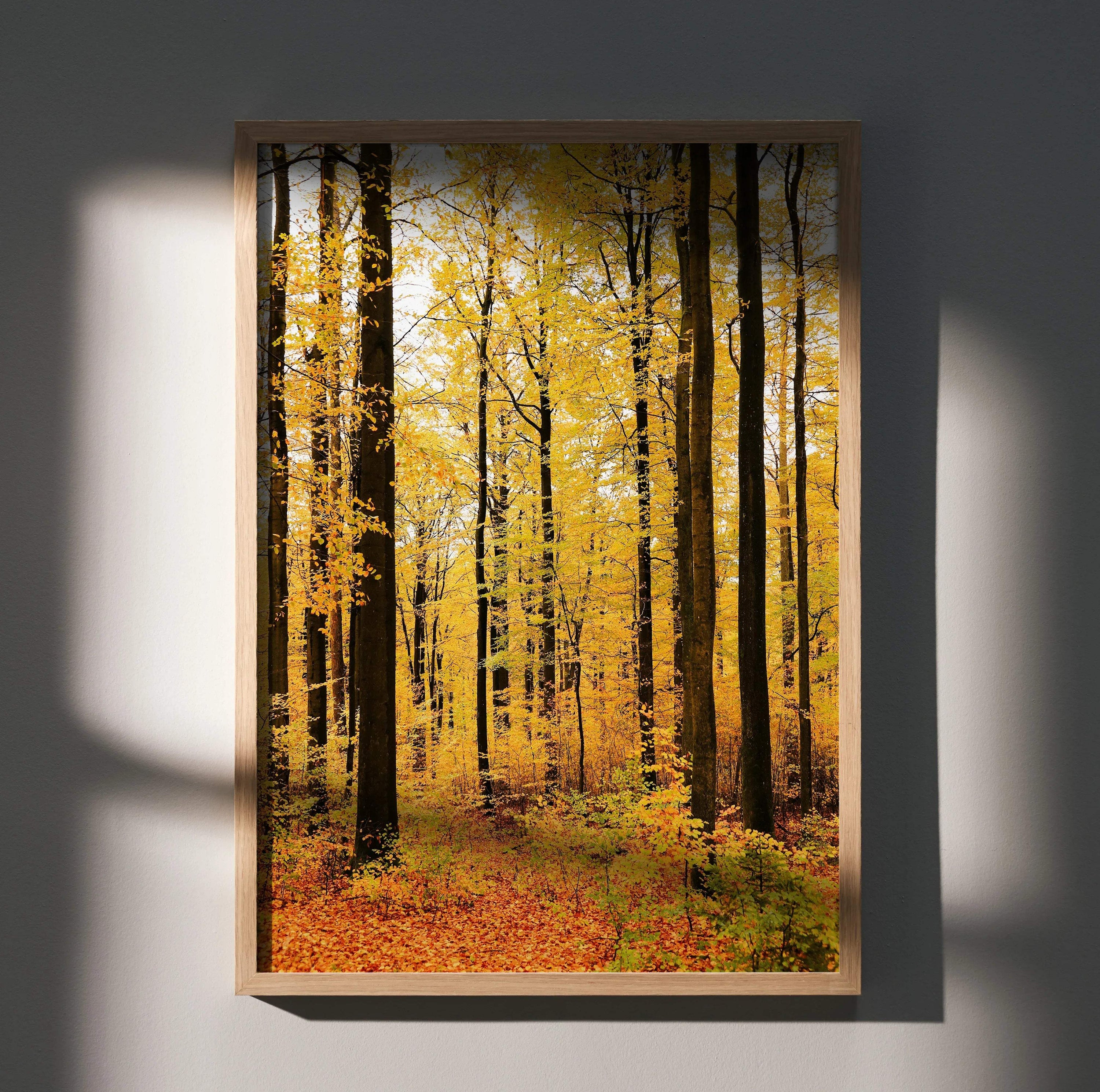 Vertical autumn forest art poster with vibrant yellow leaves and tall trees wall art.