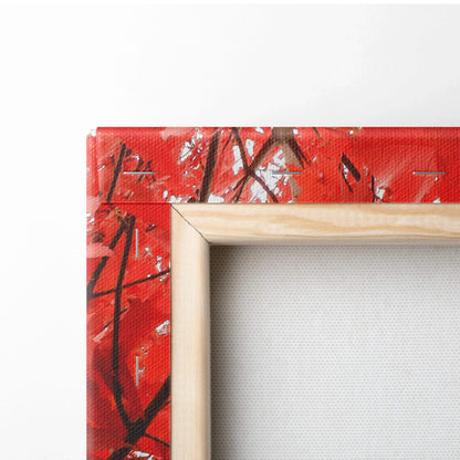 Close-up of autumn leaves-themed canvas wall art showing vibrant red leaves and natural wood frame.