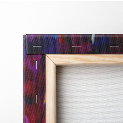 A wooden frame with a vibrant abstract canvas featuring deep purples blues and reds in a romantic couple silhouette design