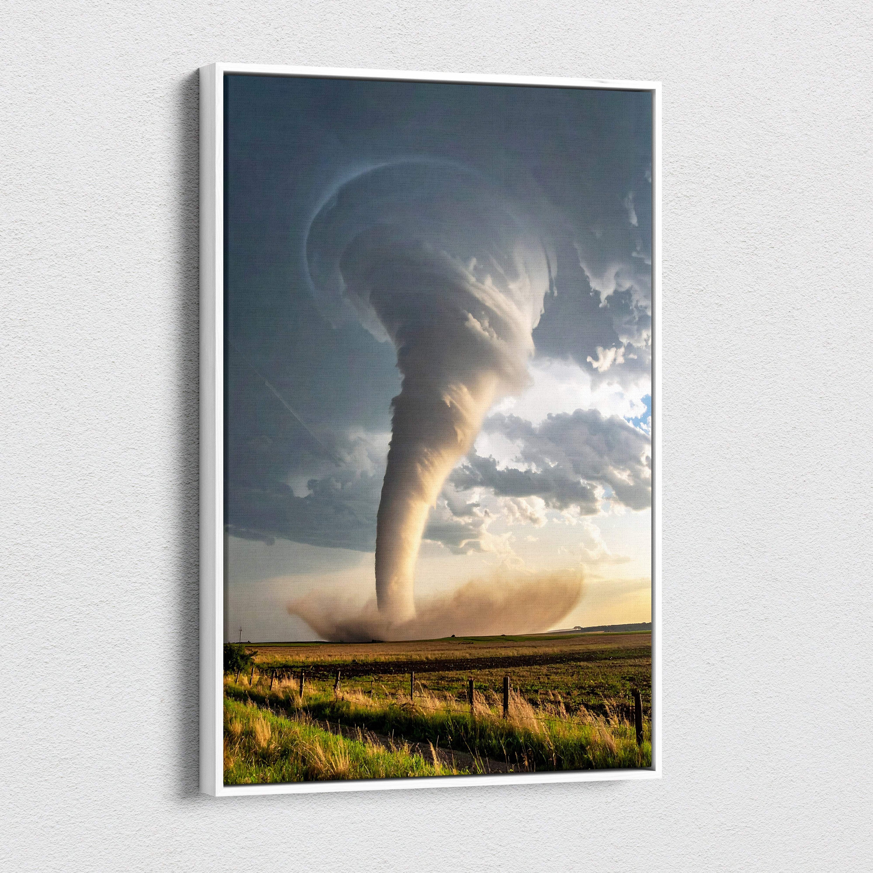 A framed canvas art print of a powerful swirling gray and white tornado for modern home storm landscape decor