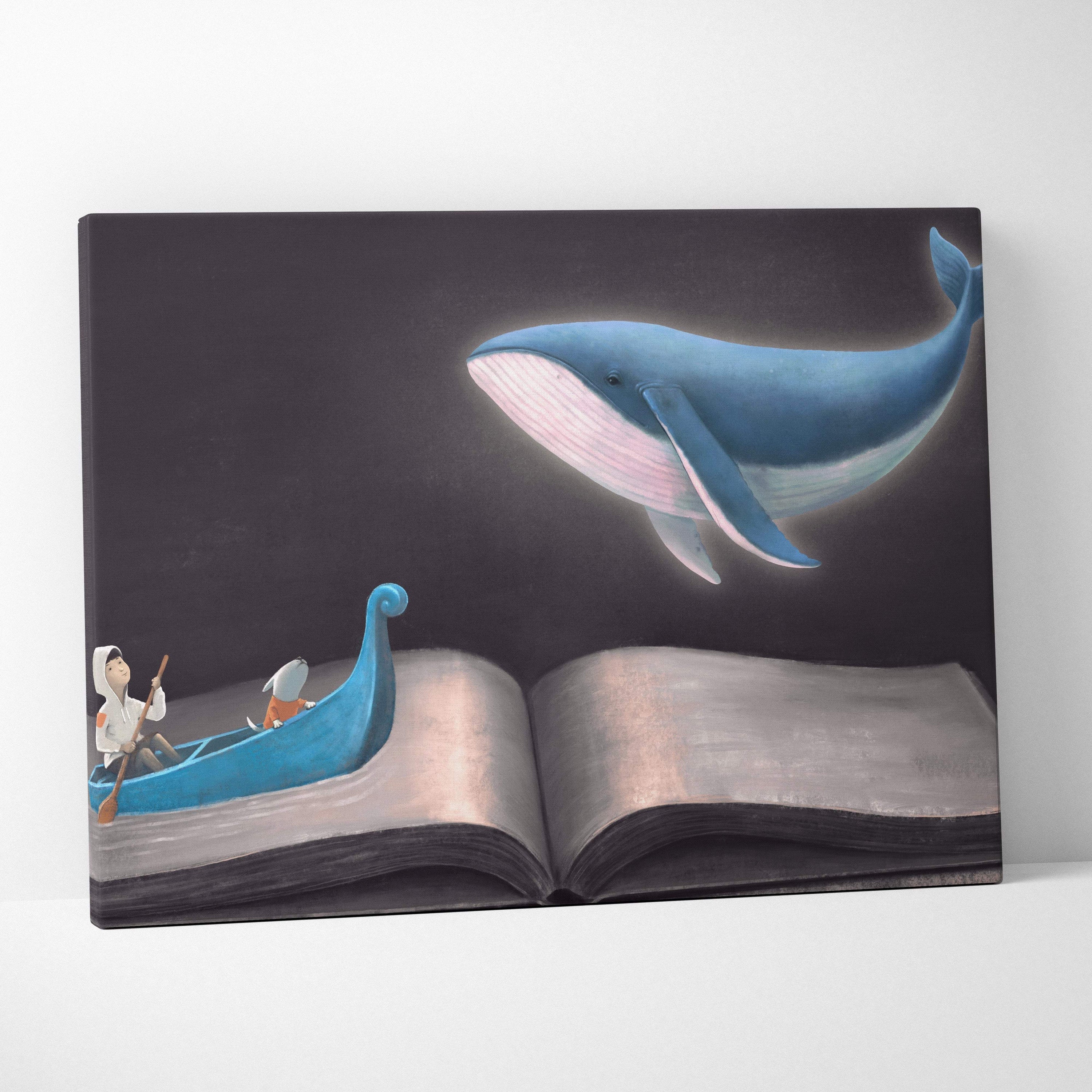 Contemporary whale book canvas wall art featuring a blue whale above an open book with a boat on dark ocean background