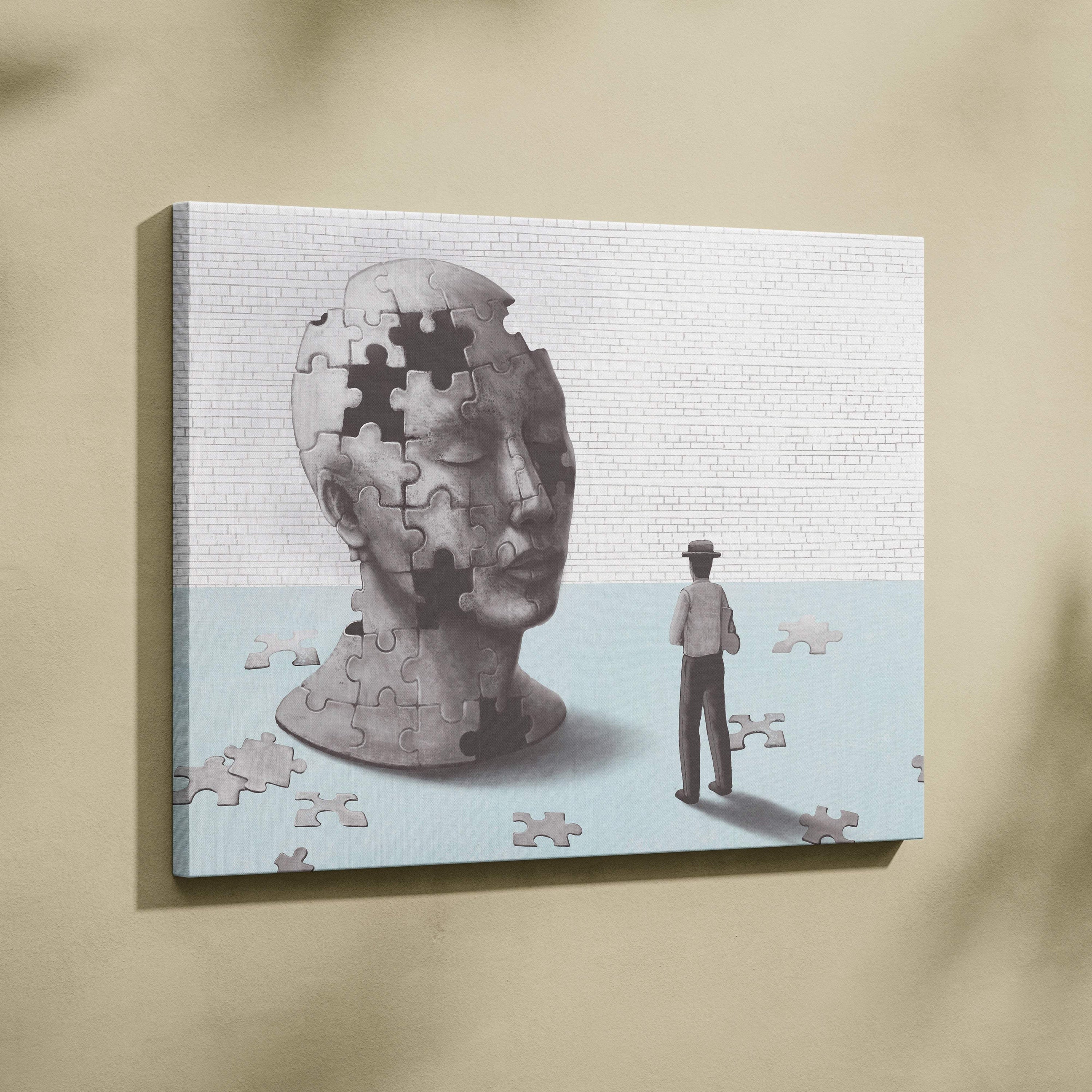 Contemporary gray puzzle-piece human head canvas wall art featuring mental health sculpture print for psychology decor