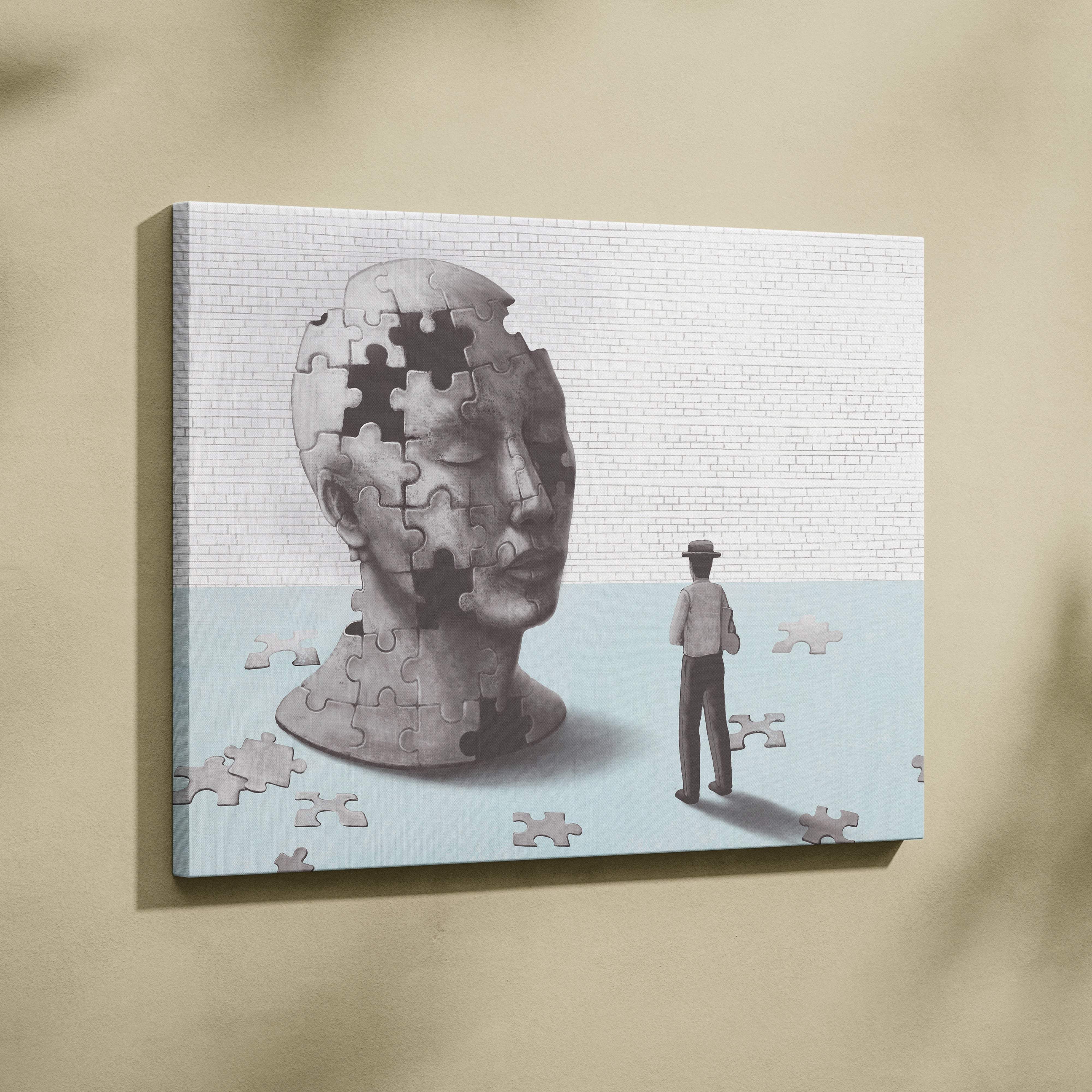 Contemporary gray puzzle-piece human head canvas wall art featuring mental health sculpture print for psychology decor