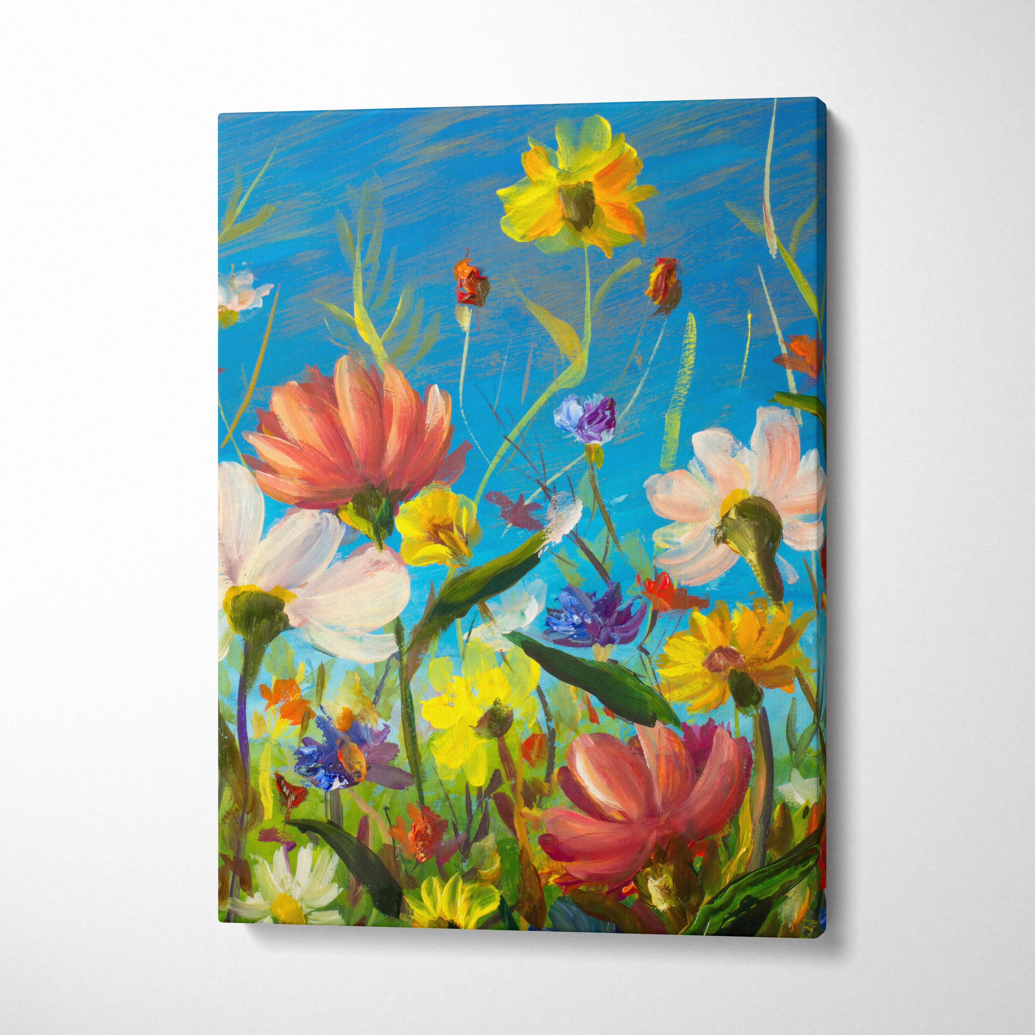 Vibrant floral garden canvas print with bold yellow pink purple blossoms against a bright blue sky in oil painting style