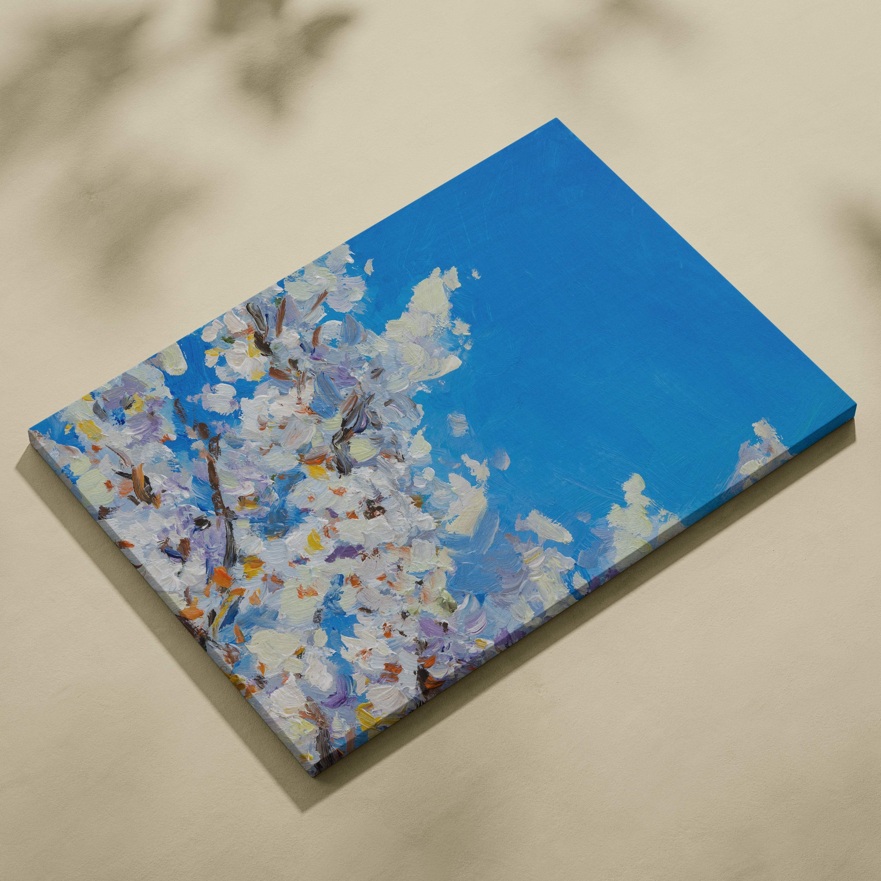 White blossom canvas print with vibrant blue sky and textured purple and white blossoms in impressionist oil style