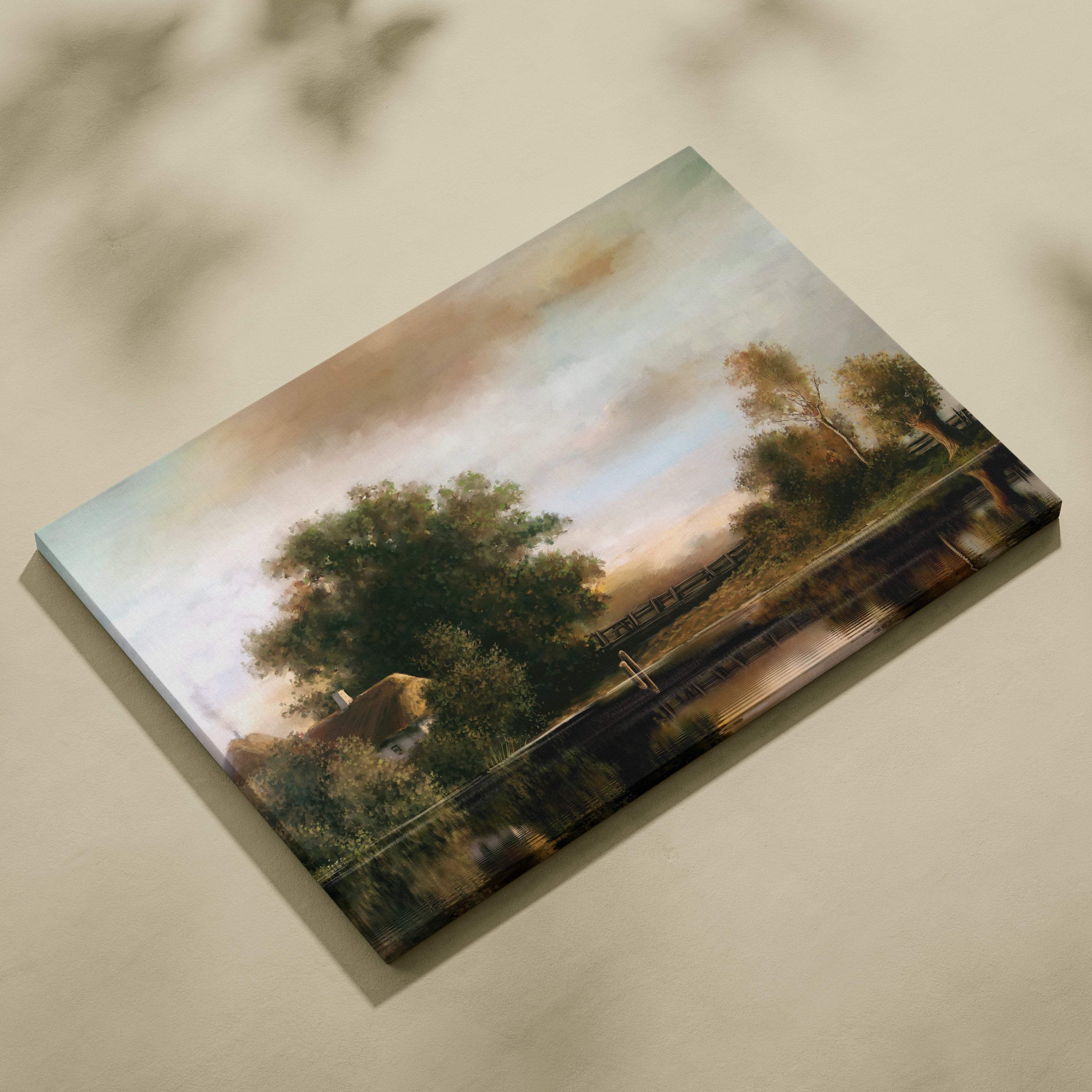Rectangular canvas print of rustic countryside painting with pastel skies, green trees, and reflective lake under golden light