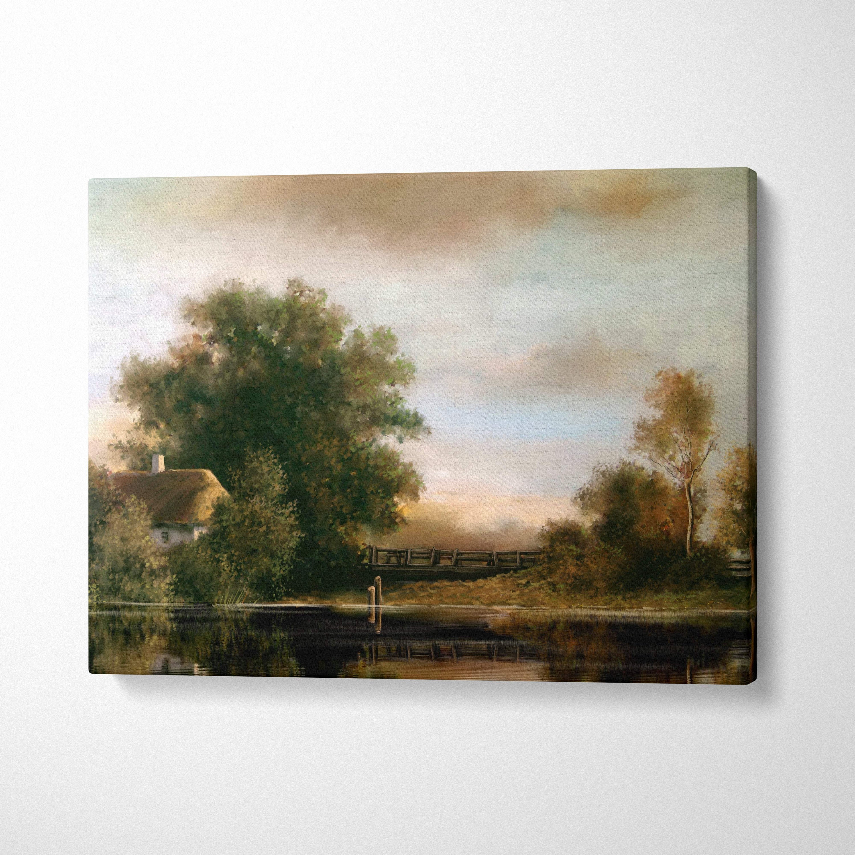 Rustic countryside canvas wall art featuring a thatched cottage by calm waters with pastel skies and autumn trees