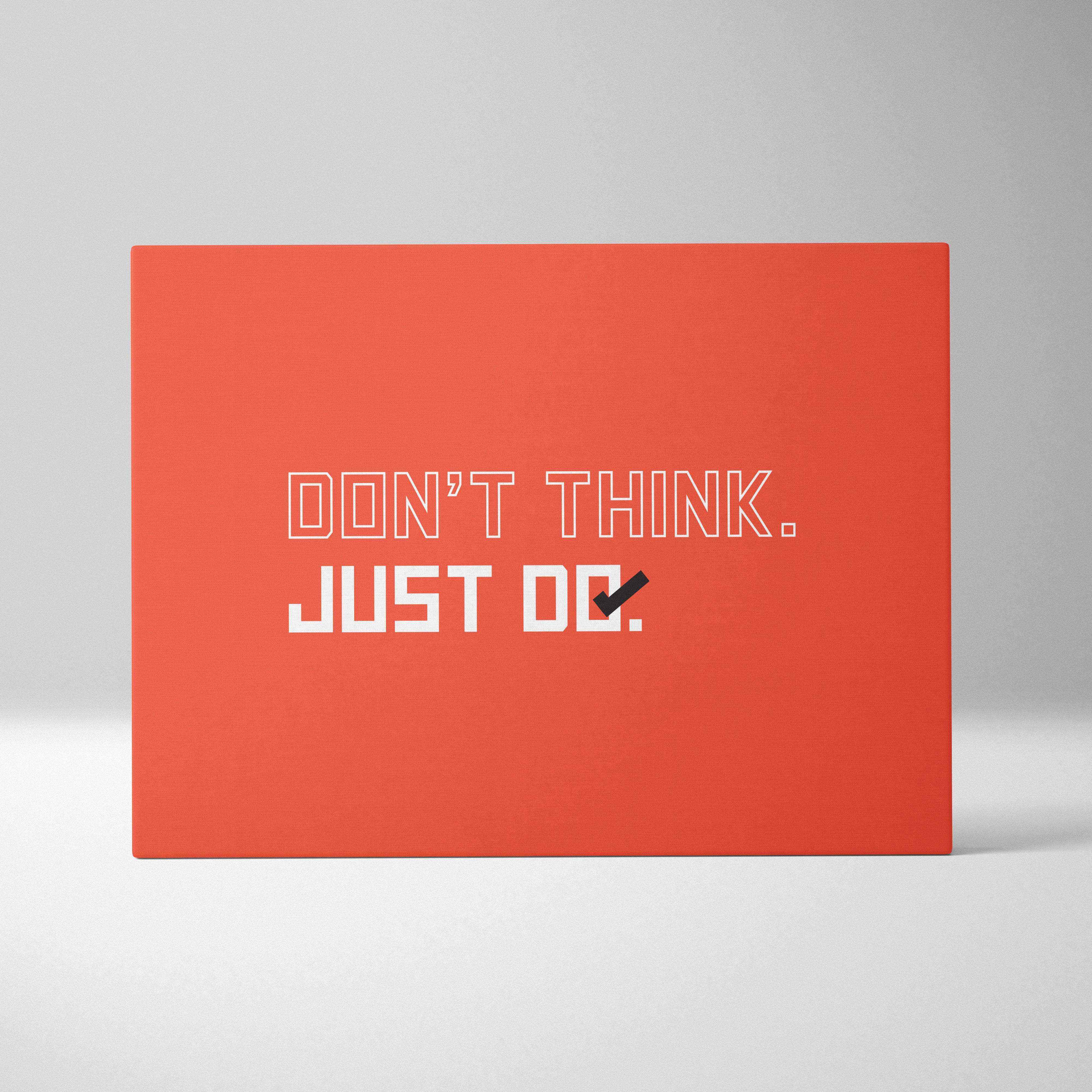 Orange rectangular canvas wall art with the phrase dont think minimalist motivational typography for office decor