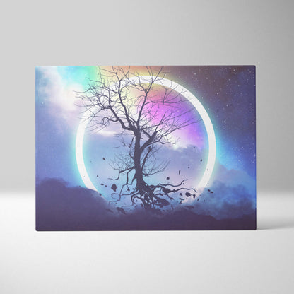 Rectangular canvas wall art of a black bare tree silhouette with roots against a glowing iridescent cosmic sky circle