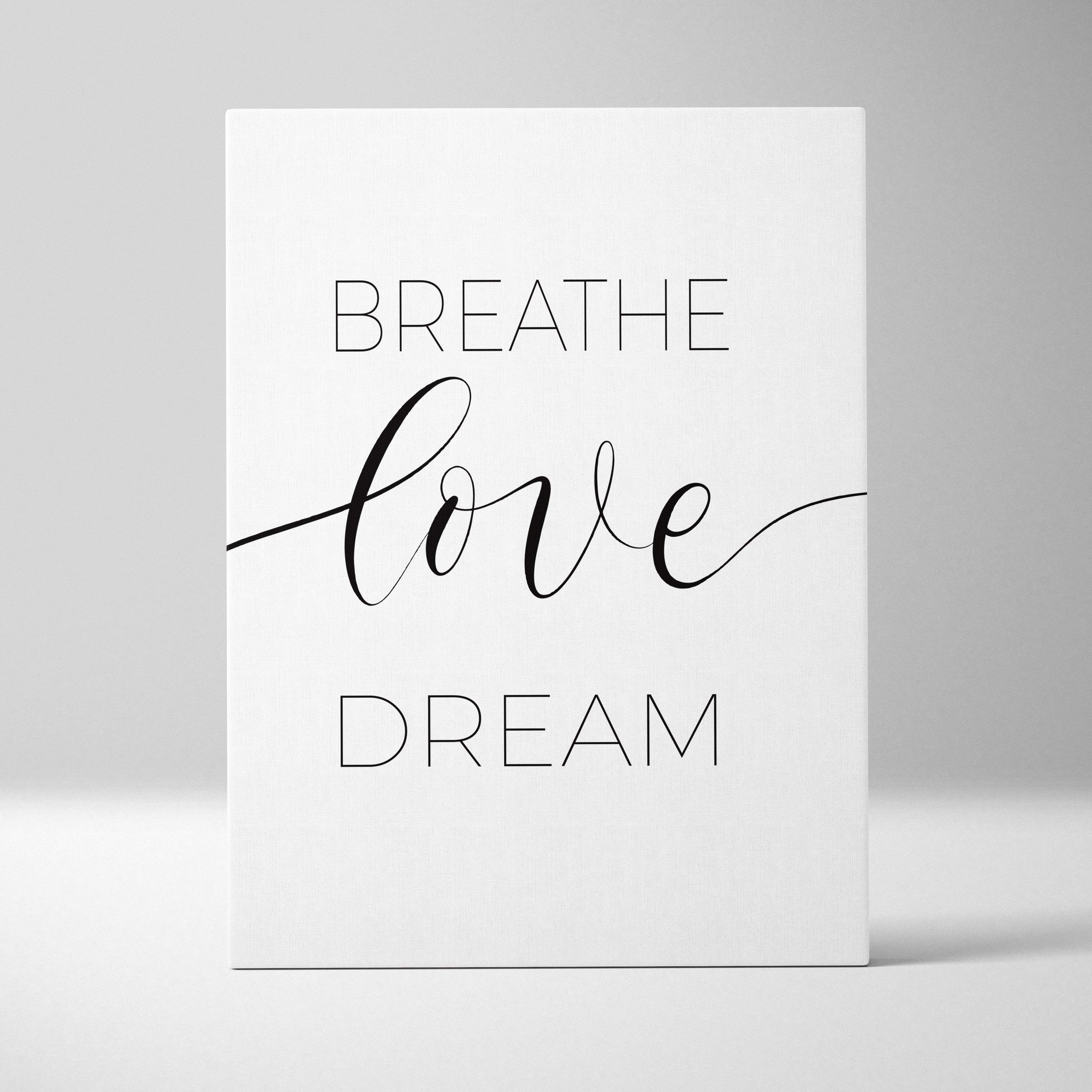 White canvas print with breathe love dream minimalist black typography inspirational wall art for bedroom or office