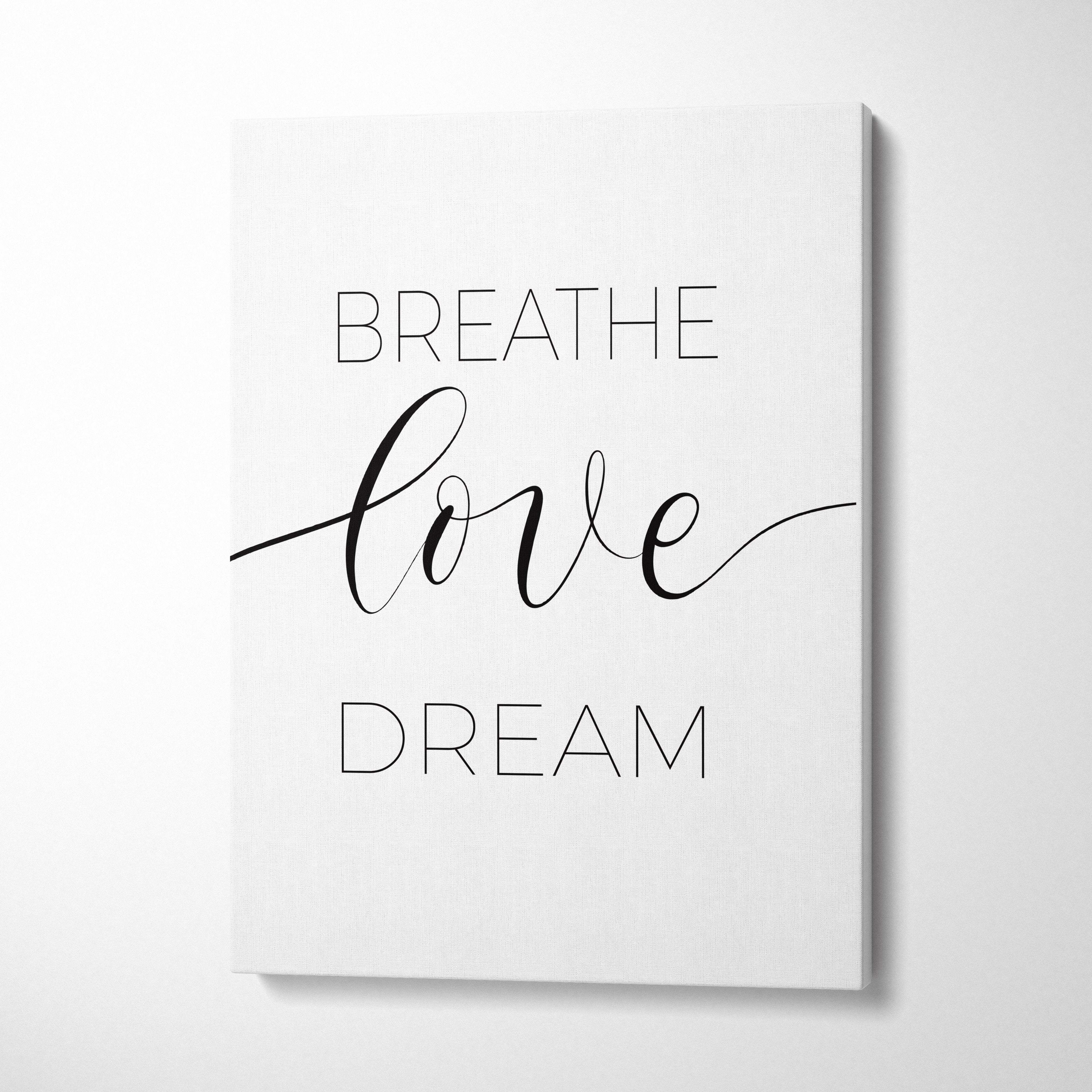White canvas print with breathe love dream in black calligraphy minimalist wall art for bedroom office or home decor