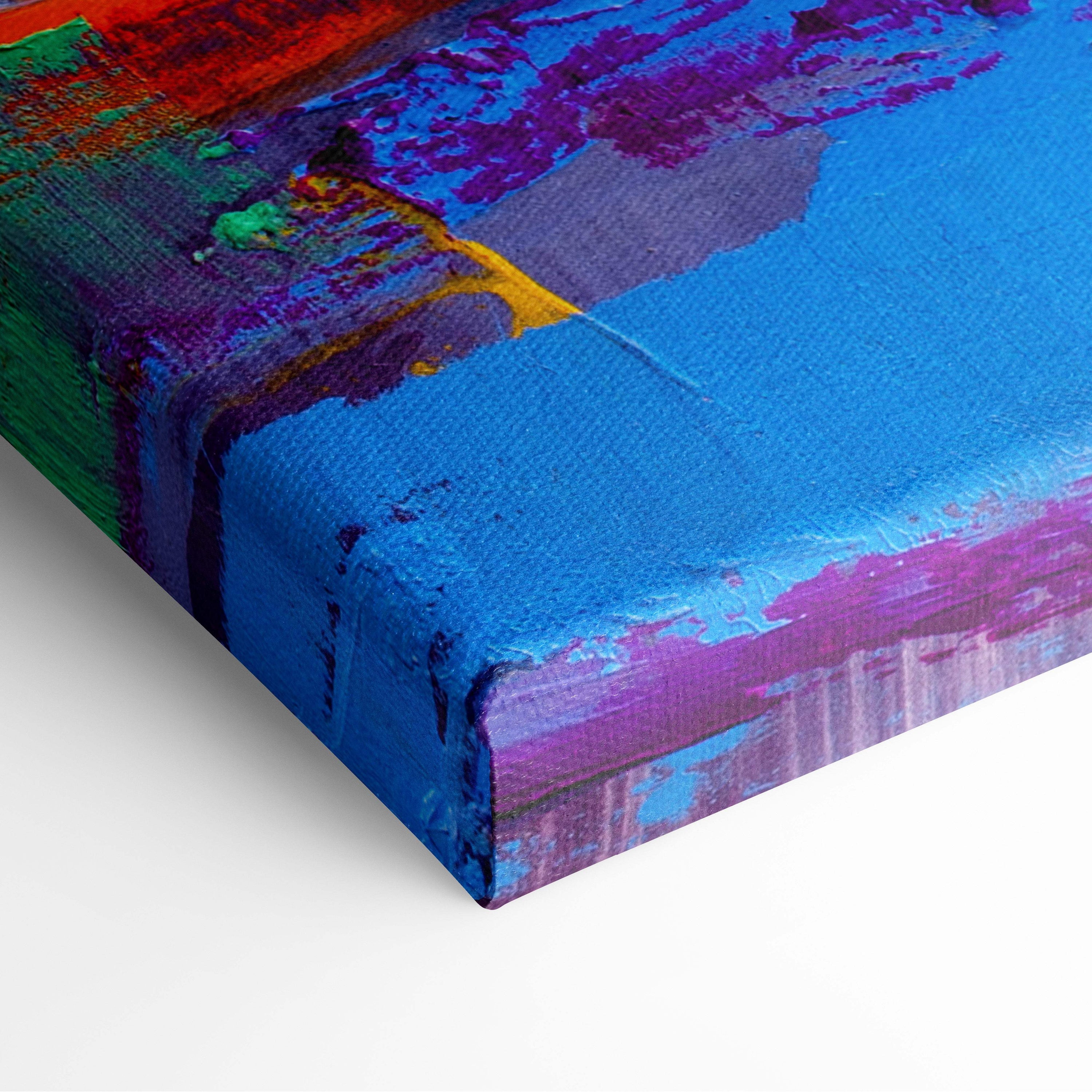 Abstract tree landscape canvas print with vibrant blue purple green and red brushstrokes on textured fabric surface