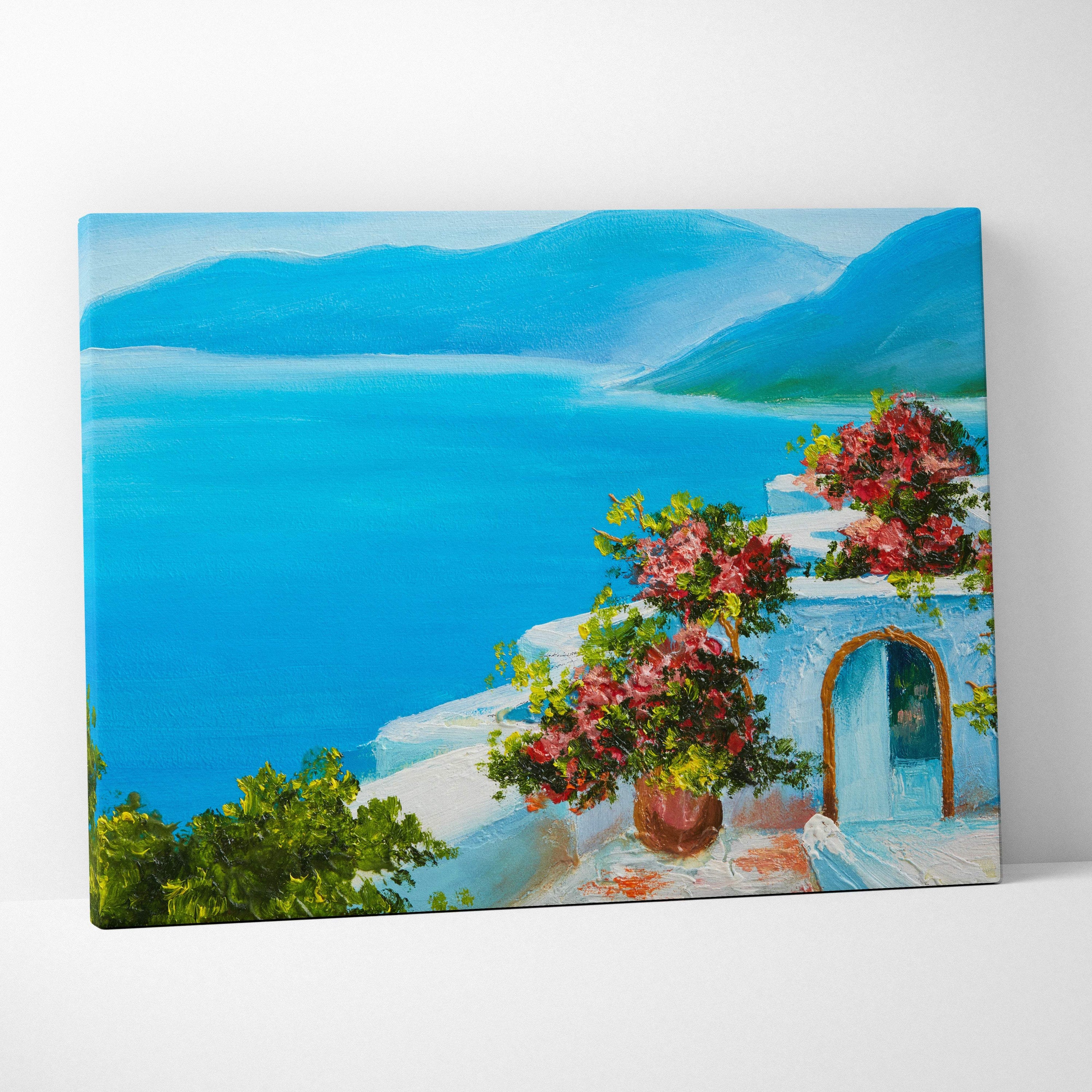 Mediterranean coastal villa canvas print of vibrant blue sea whitewashed buildings and pink flowers in terracotta pot