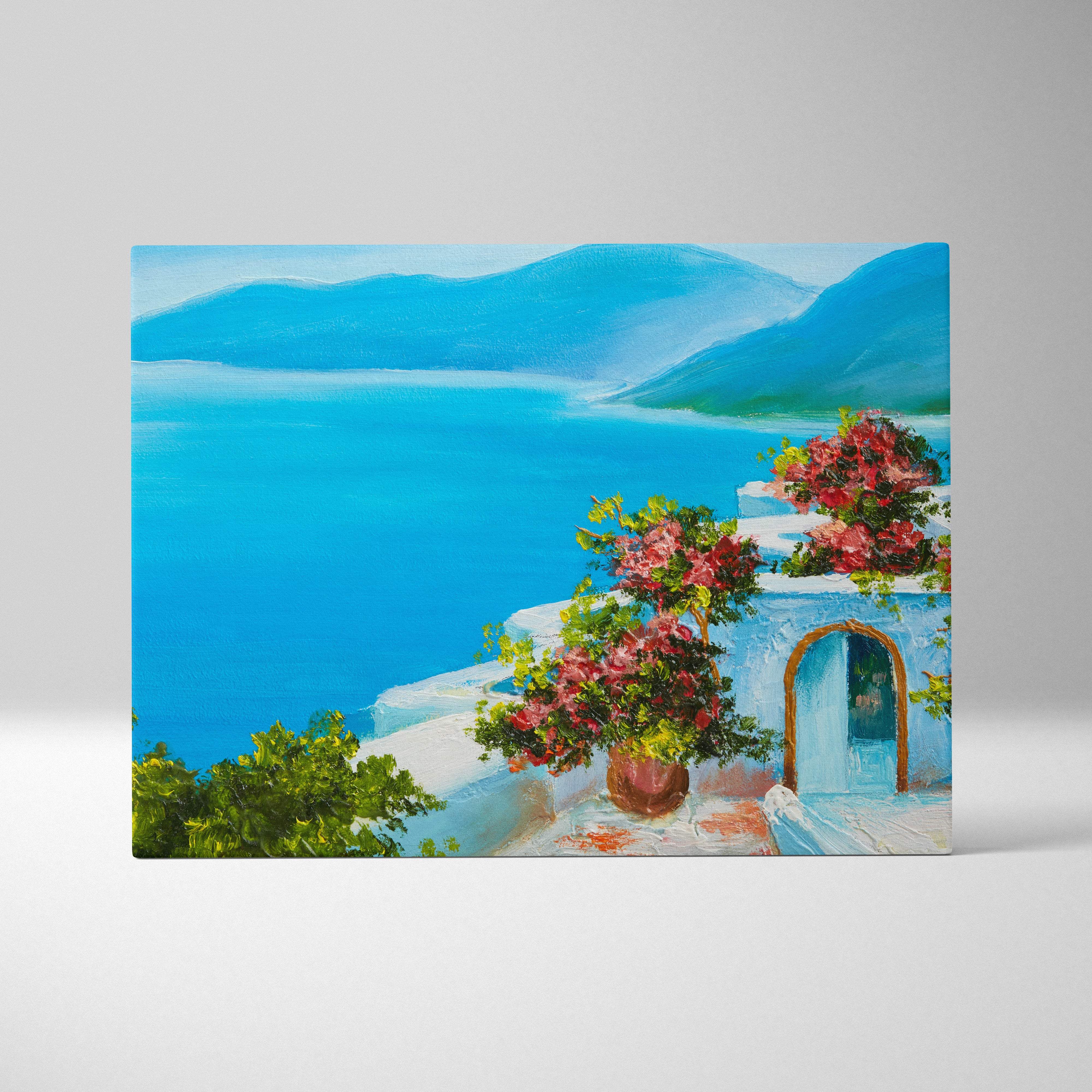 Mediterranean coastal villa canvas print featuring white-washed buildings pink flowers and blue sea landscape