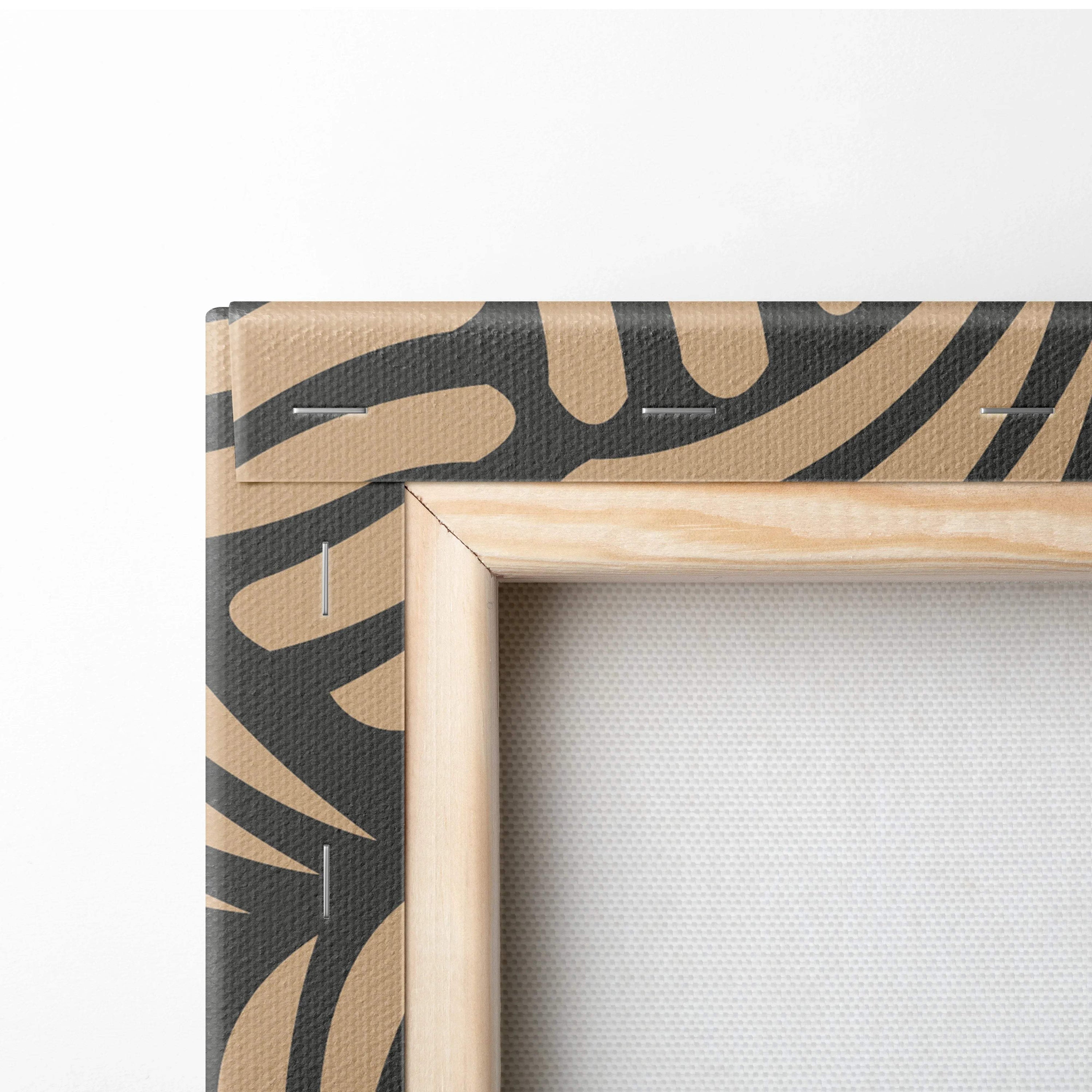 Light wood-framed canvas with black tan leaf pattern and curved shell motifs