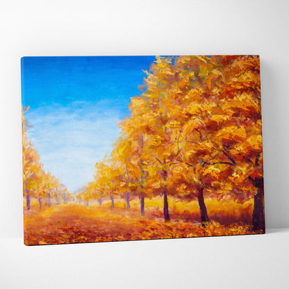 Vibrant autumn trees landscape painting on stretched canvas featuring golden and orange foliage with a blue sky