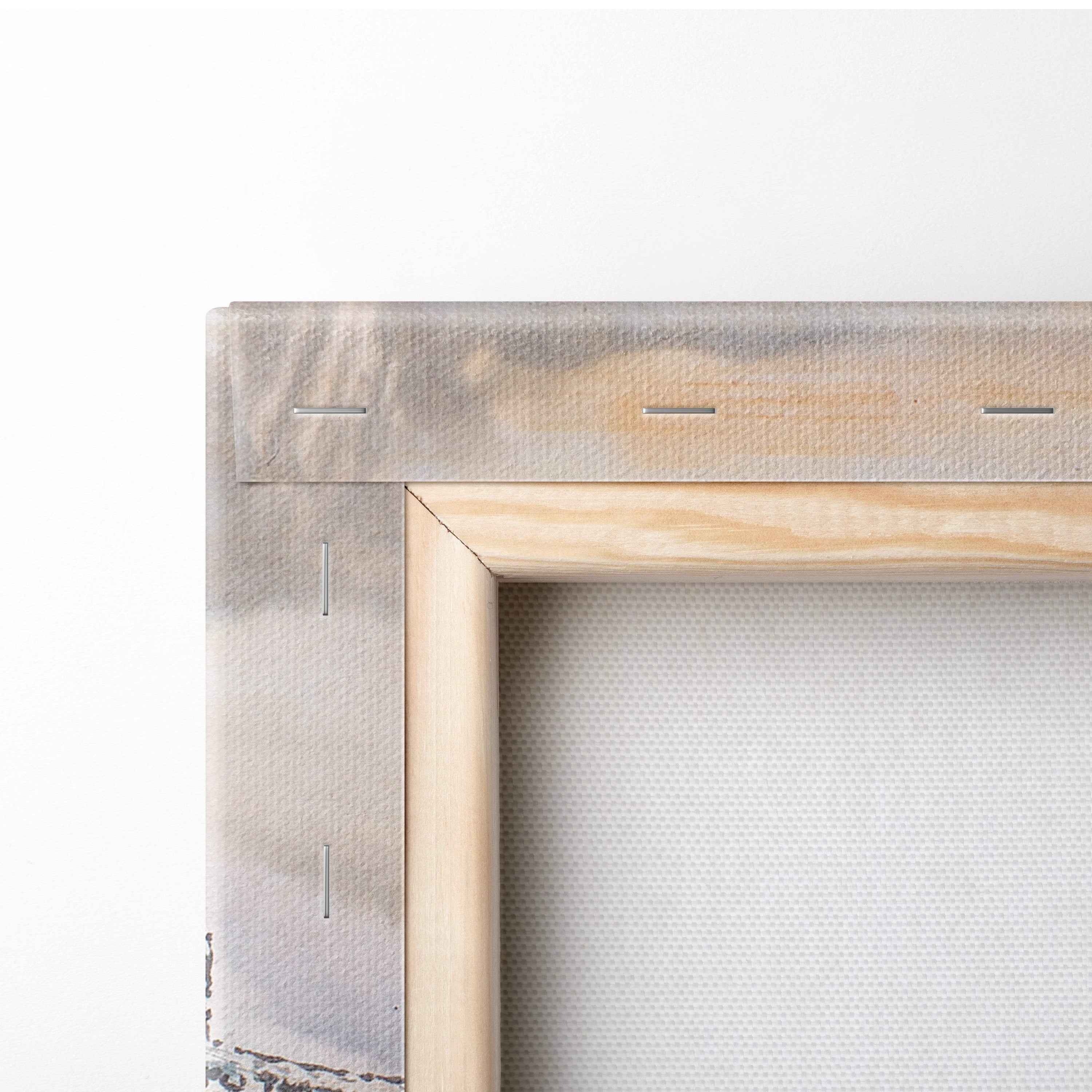 Back view of light-colored wooden canvas frame with textured off-white fabric backing for great wall mountain landscape art