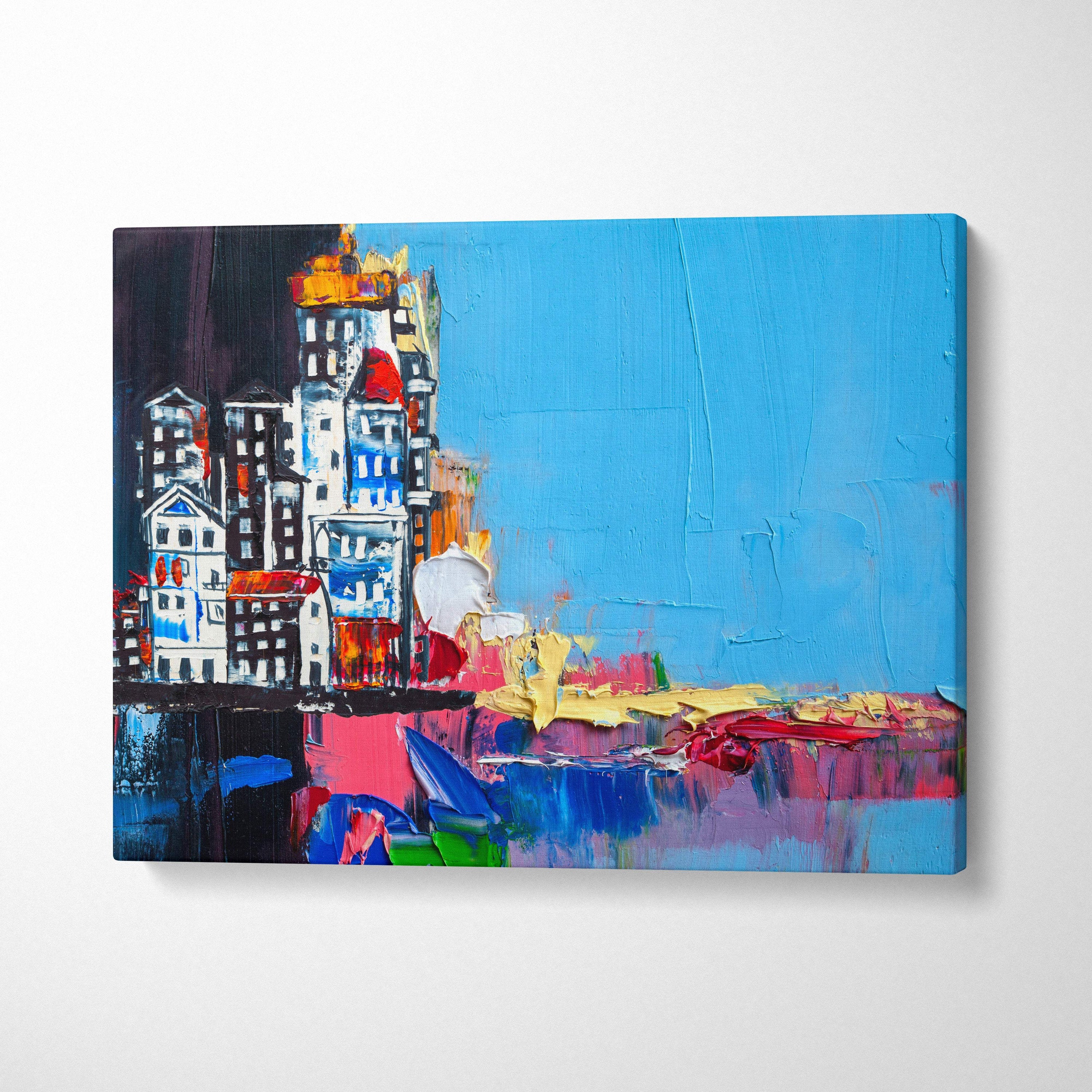Abstract city buildings painting style wall art with vibrant brushstrokes and vivid blue sky on textured canvas print