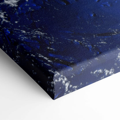 Massive hurricane satellite view canvas art featuring deep blue ocean with swirling white and black abstract patterns