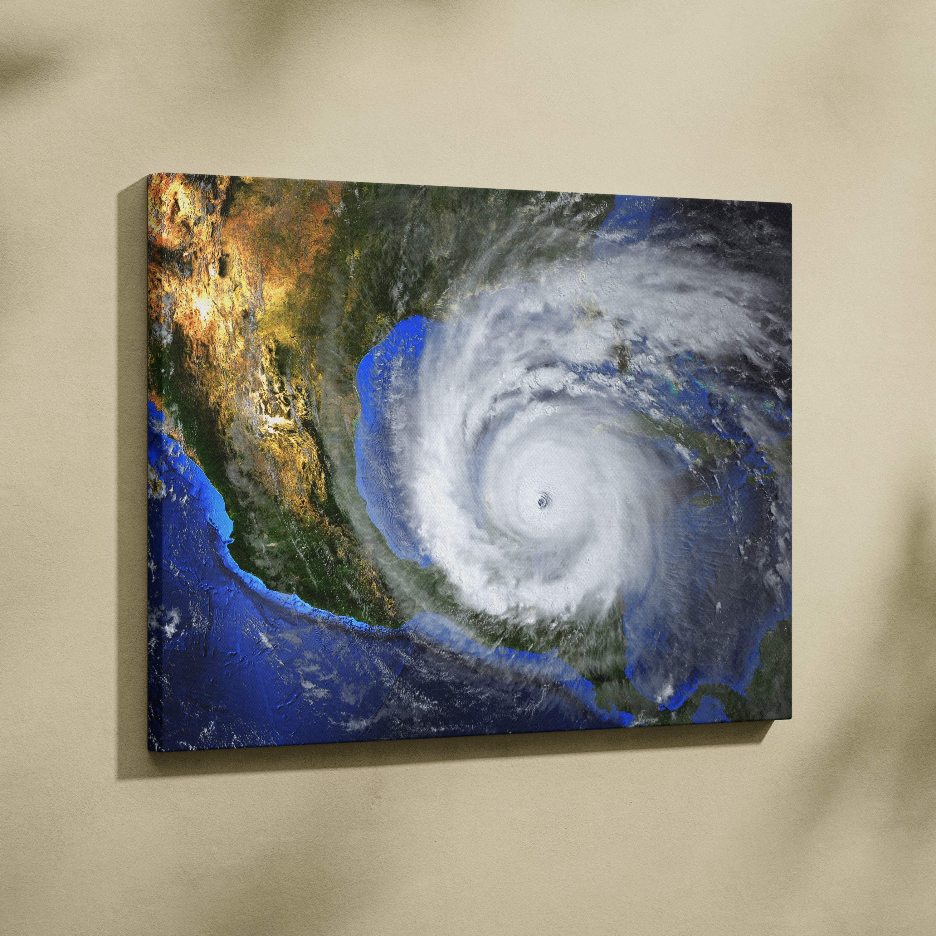 A vibrant stretched fabric canvas featuring a deep blue ocean and white spiral hurricane for dramatic wall decor