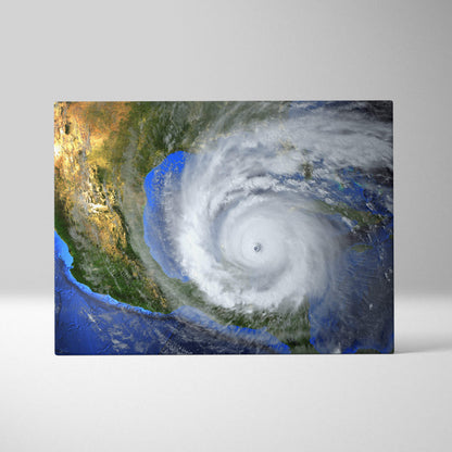 A rectangular canvas print of a massive hurricane over the gulf of mexico with vibrant blue ocean and detailed clouds