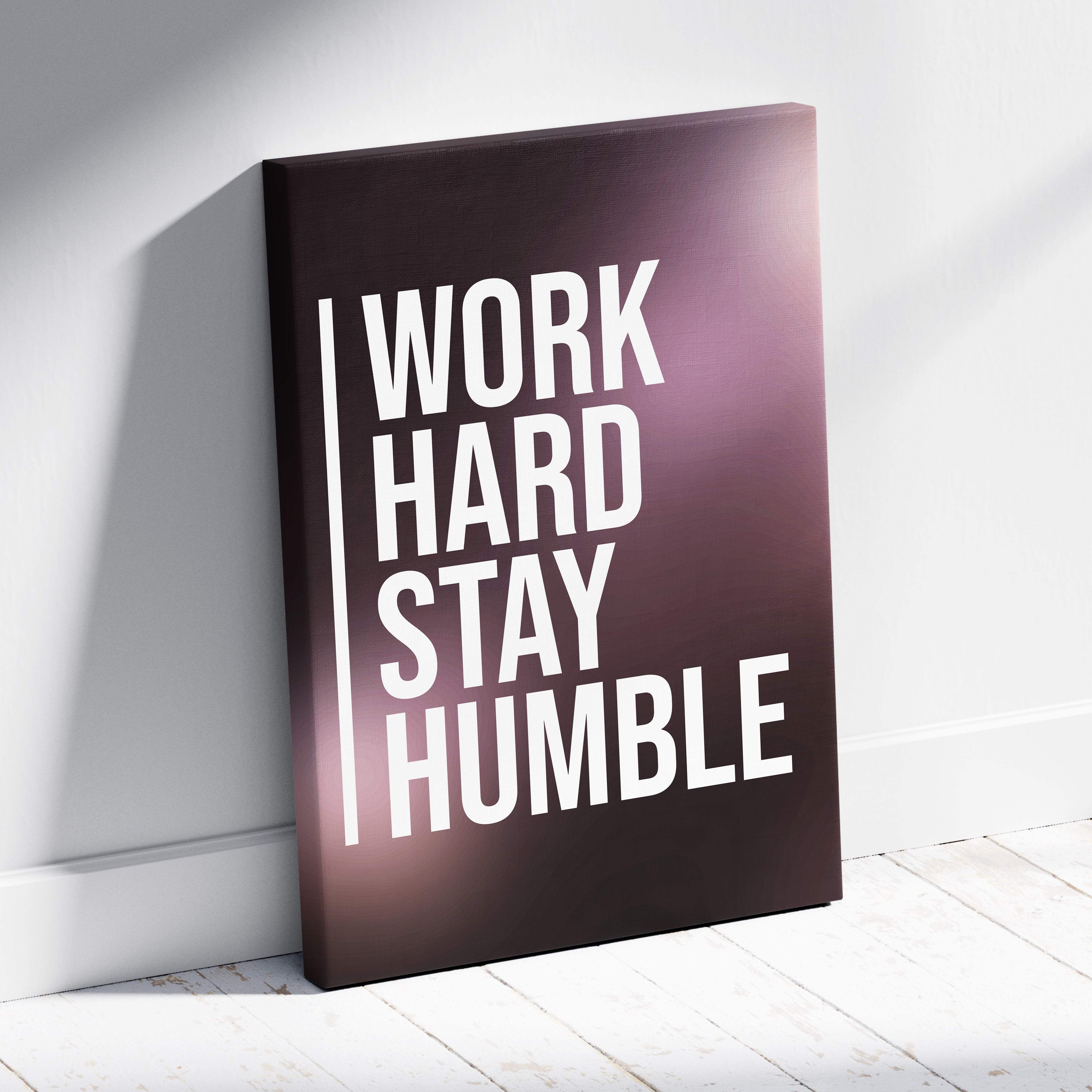 Dark purple canvas print with bold white work hard stay humble motivational typography for office gym or home decor
