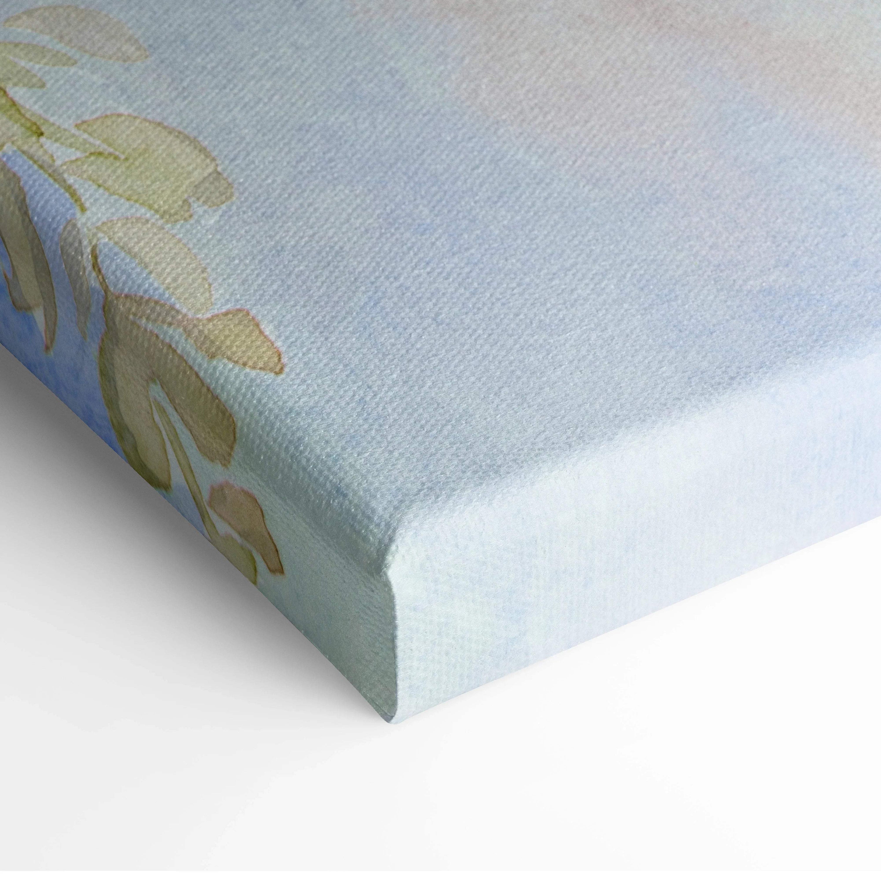 Vibrant watercolor floral canvas wall art in pink red blue green hues on soft blue background