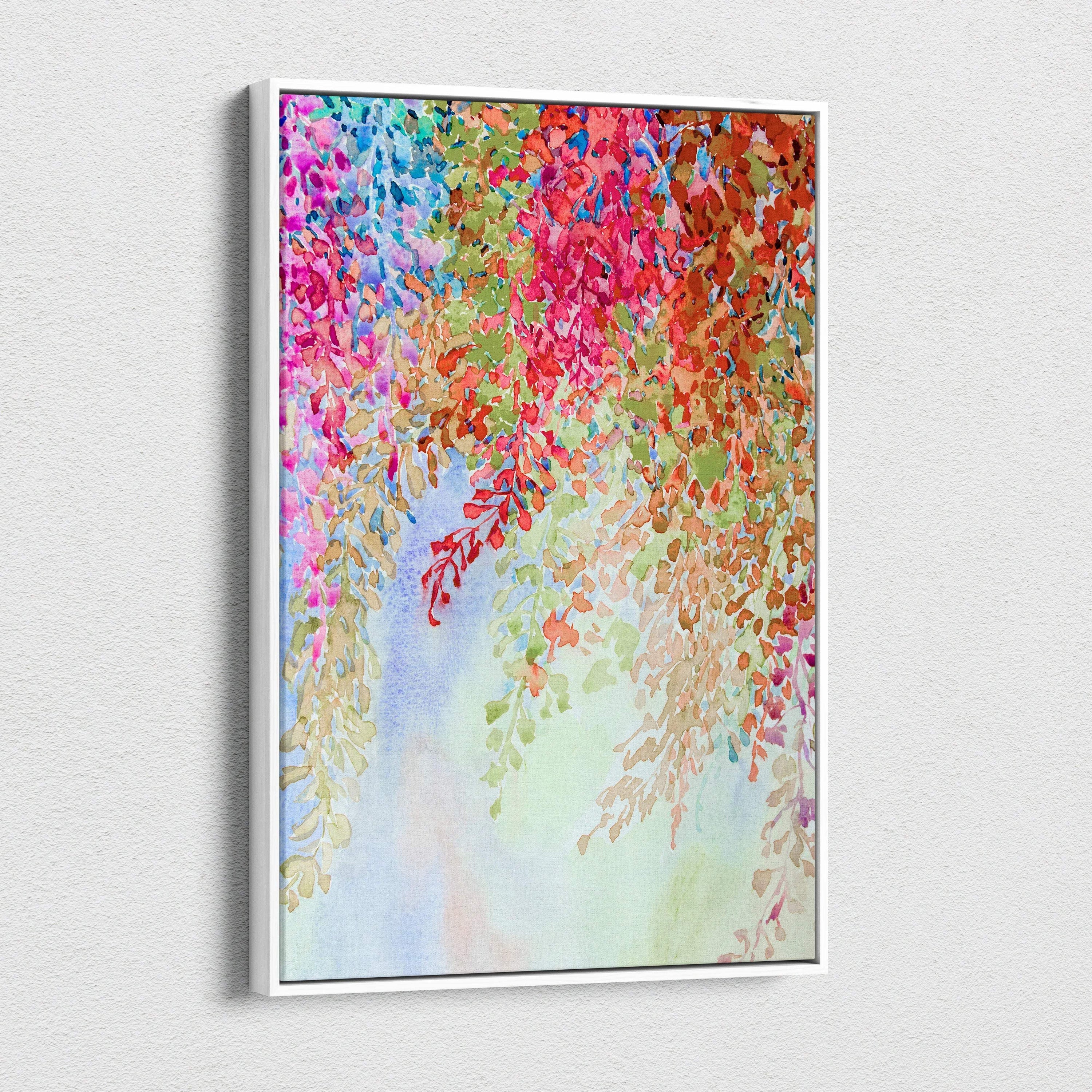 Vibrant watercolor floral canvas art with cascading pink red blue green blossoms in white frame